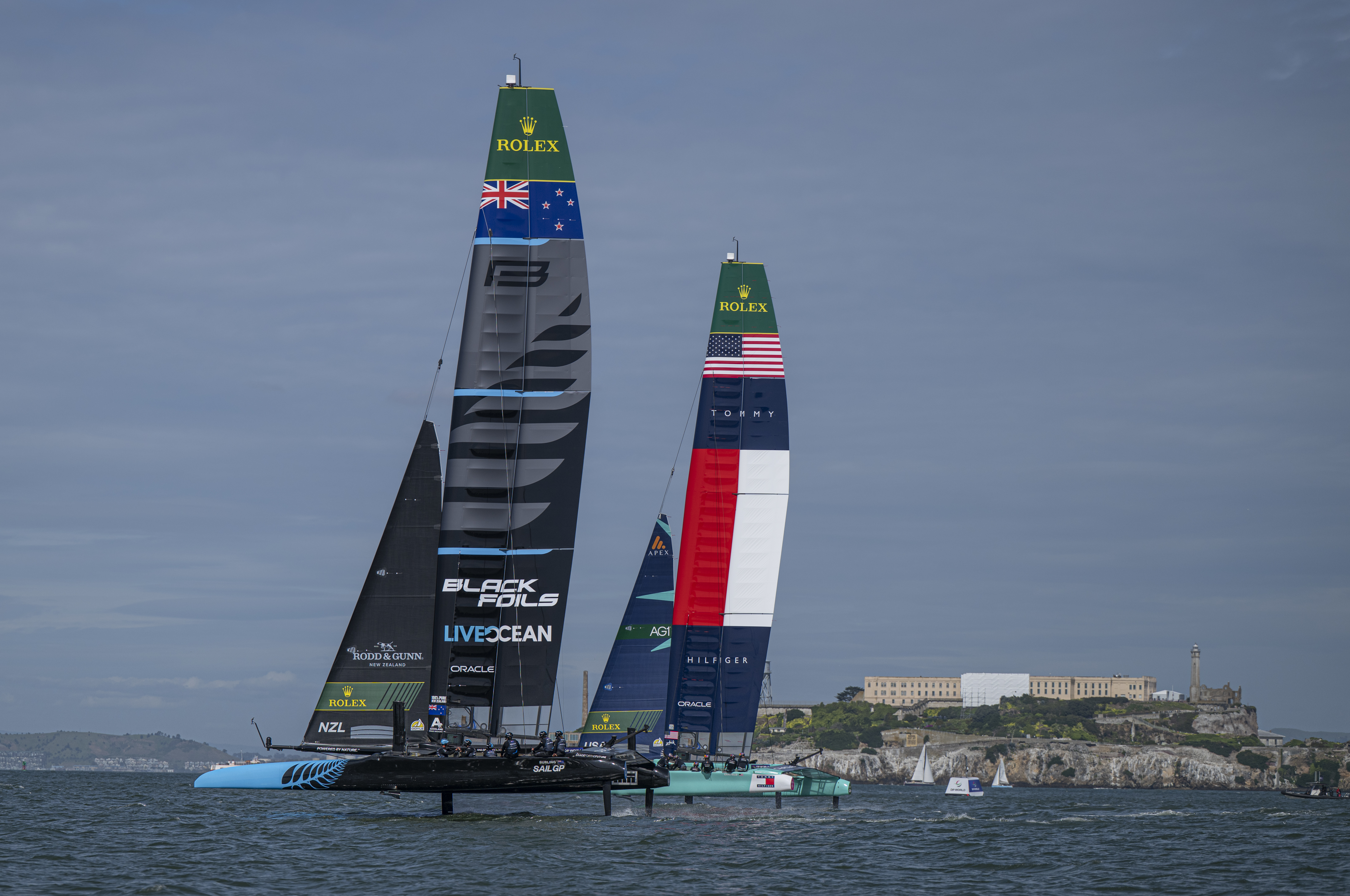New Zealand SailGP Team helmed by Peter Burling and USA SailGP Team helmed by Taylor Canfield as they pass Alcatraz during a practice session ahead of the Oracle San Francisco Sail Grand Prix held in San Francisco, United States. Photo / SailGP