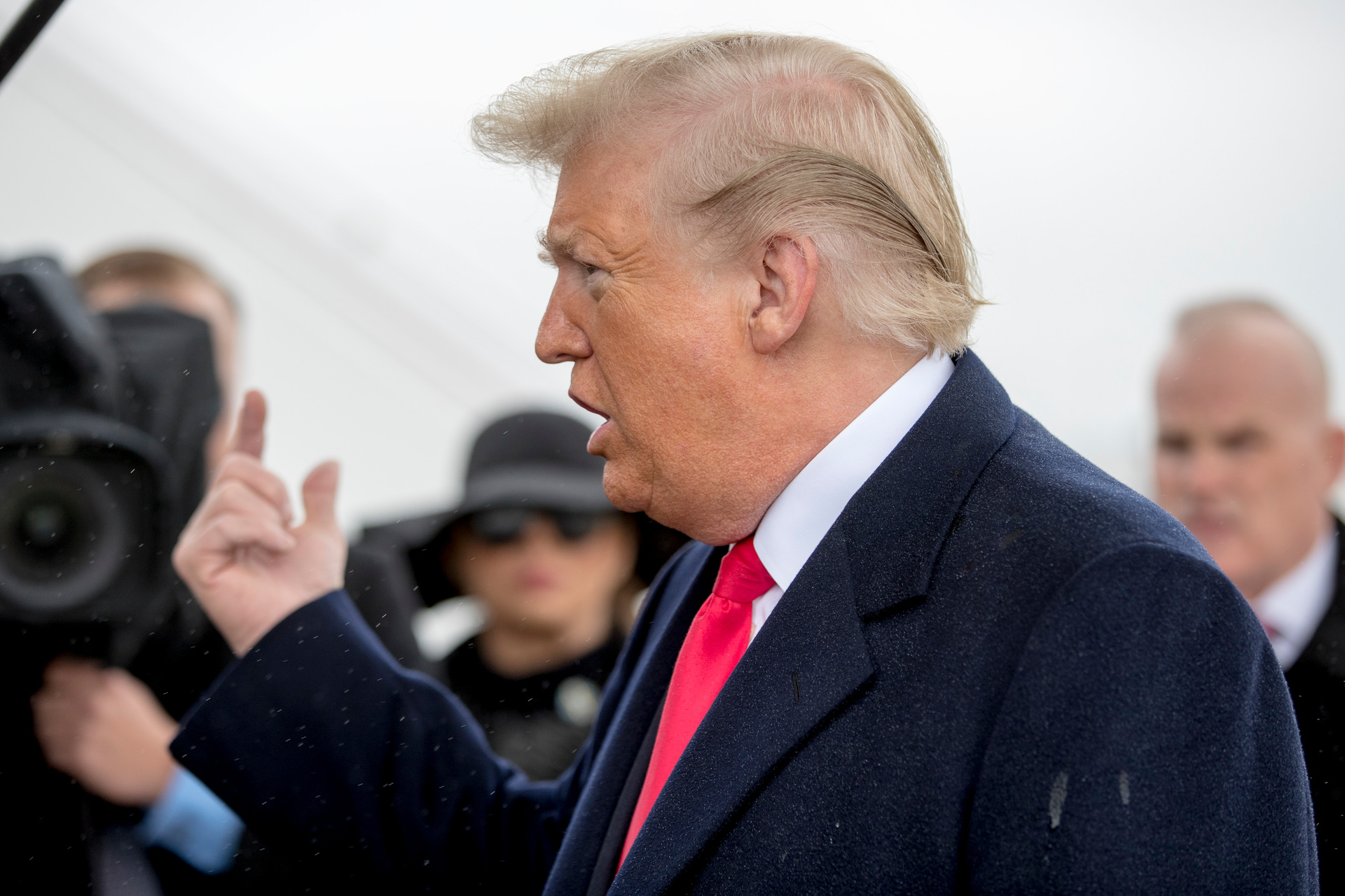 President Donald Trump speaks to reporters about a shooting at a Pittsburgh synagogue as he arrives at Air Force One. Photo / AP
