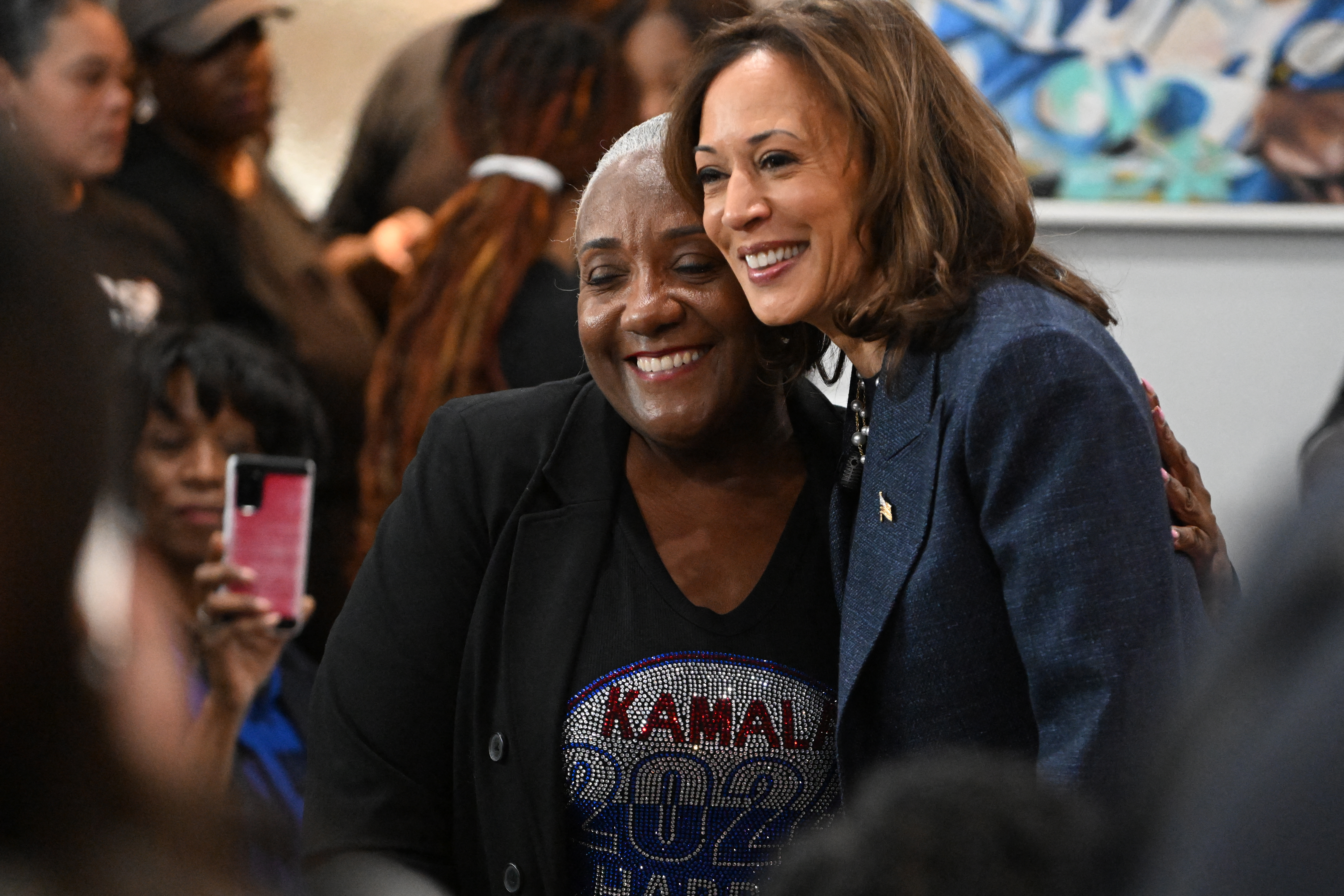 US Vice President and Democratic presidential nominee Kamala Harris greets people at Kuzzo's Chicken & Waffles restaurant in Detroit, Michigan. Photo / AFP