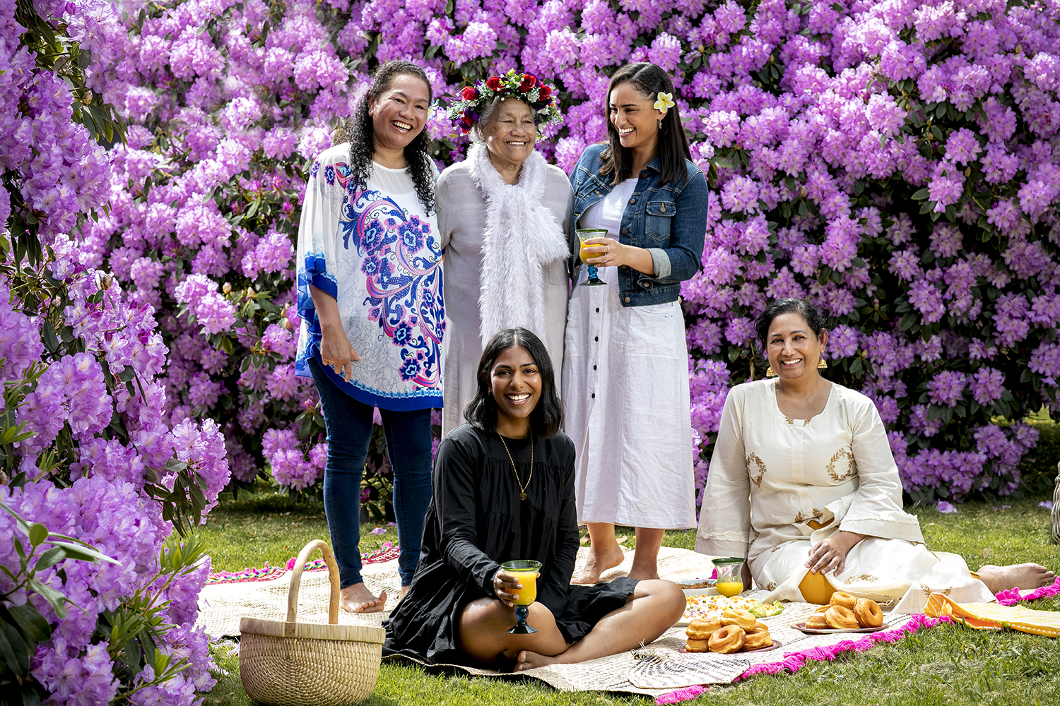 Shenine and Grace learned how to cook from their mothers, Pem Dube (seated) and Ra Nio-Akai, and Grace's grandmother, Tiava Nio. Photo / Babiche Martens