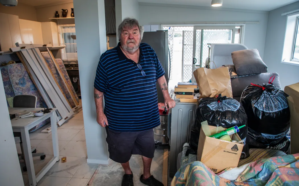 Kevin Buchanan has been living with his family in a portacom since the flood. Photo / Nick Monro