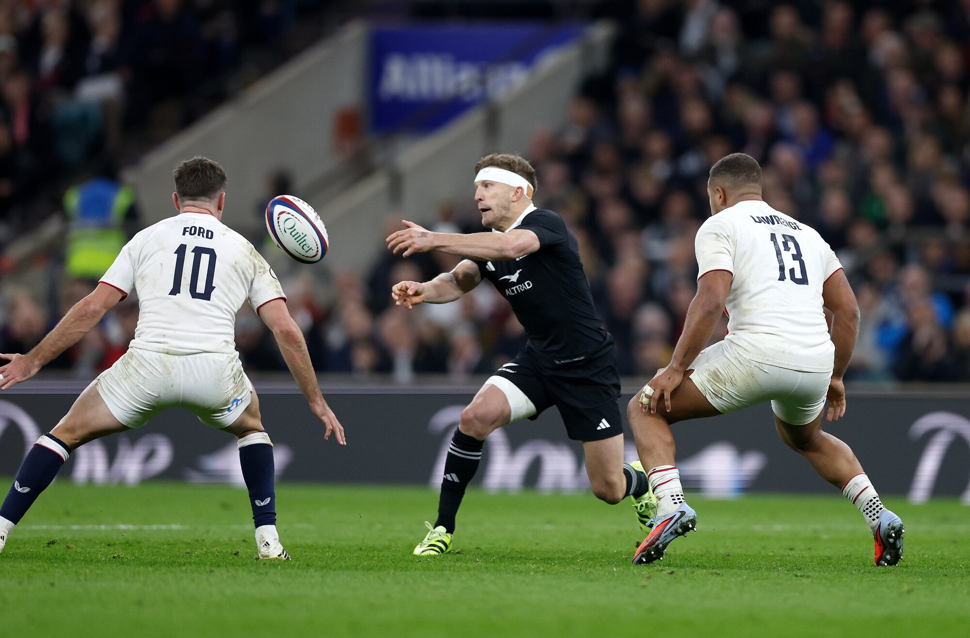 Damian McKenzie in action for the All Blacks against England. Photo / Photosport