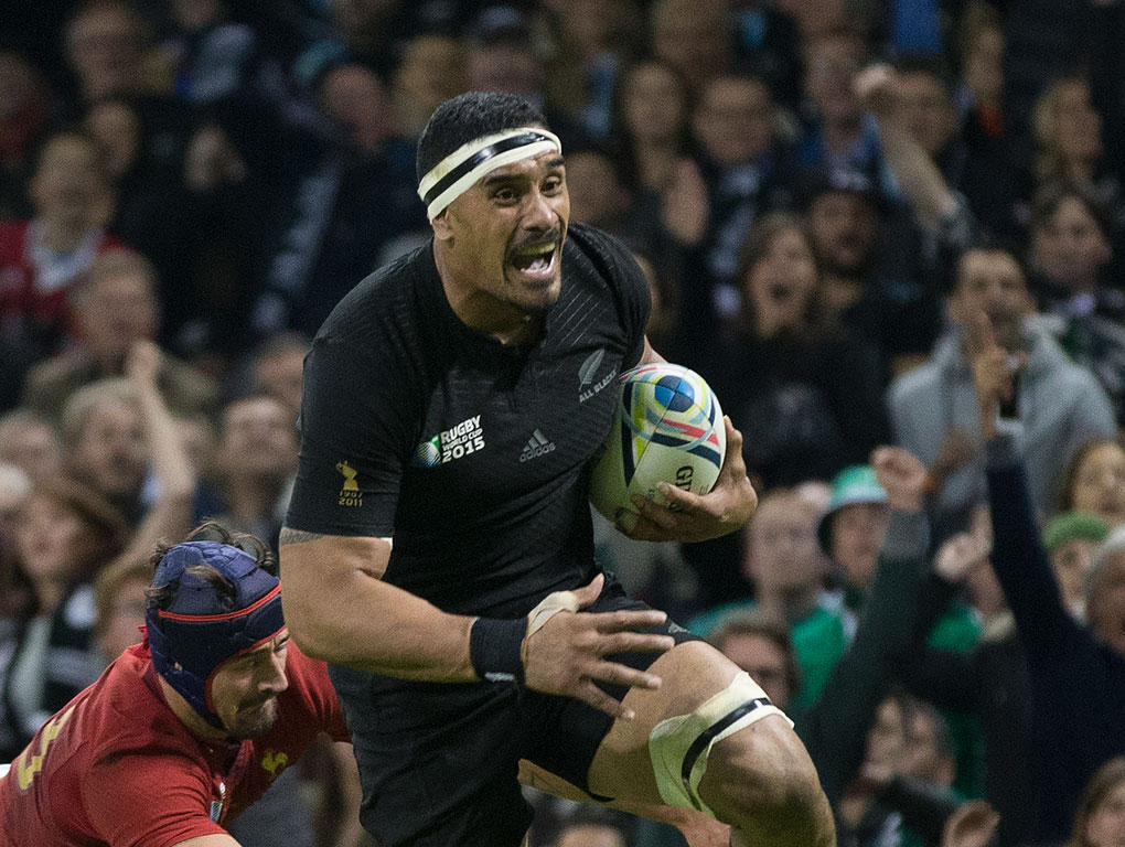 Jerome Kaino on his way to score a try during the quarterfinal against France. Photo / Brett Phibbs
