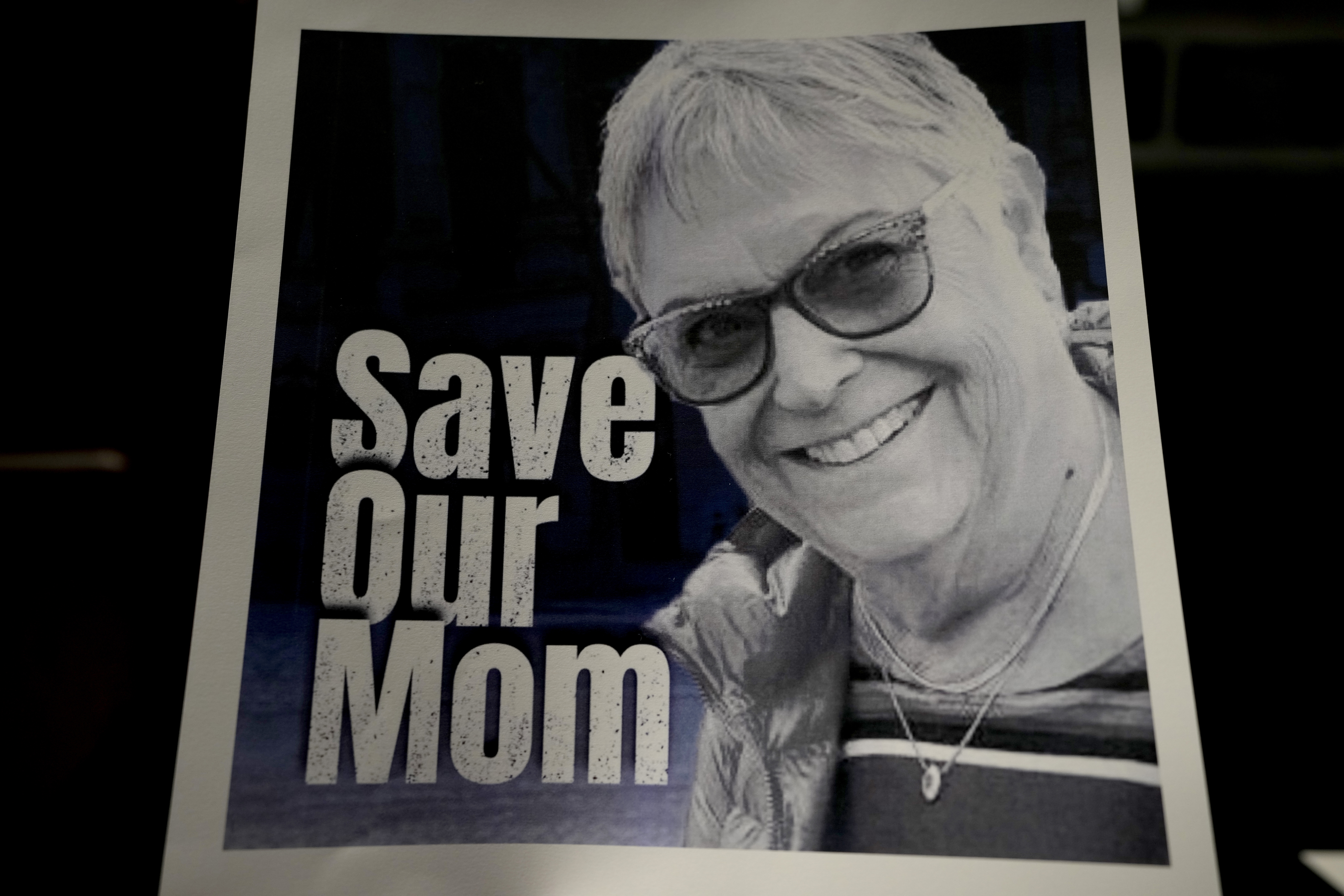 A poster of Ada Sagi, the 75-year-old mother of Noam Sagi, is on display at a press conference of British children of Israeli hostages at a hotel in London on Thursday, October 12, 2023. Noam Sagi, 53, is a London-based psychotherapist who grew up on Kibbutz Nir Oz. His 75-year-old mother, Ada Sagi, was taken hostage on October 7. Sharon Lifschitz, 52, is an artist and academic whose parents are peace activists aged 85 and 83 and who were taken hostage too. AP Photo / Kirsty Wigglesworth