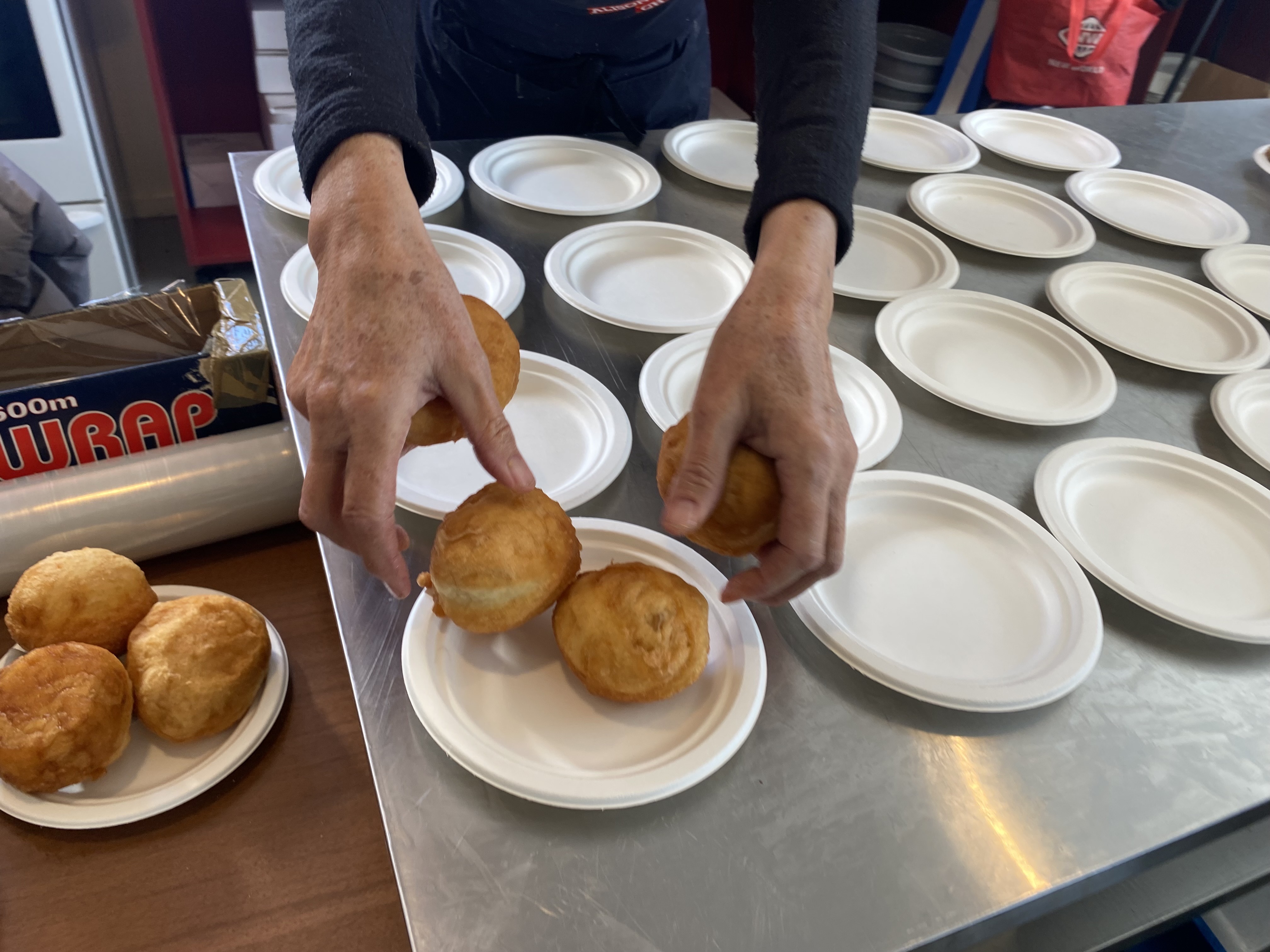 Kai being prepared in the marae kitchen for the many guests who came to mourn Takutai Tarsh Kemp. Photo / Julia Gabel
