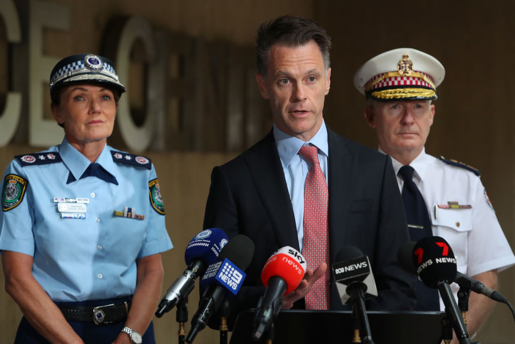 NSW Premier Chris Minns, NSW Police Commissioner Karen Webb and Ambulance Commissioner Dominic Morgan speak during a press conference in Sydney following a stabbing at a church in Wakeley, which was followed by riots. Photo / Getty Images