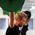 Shunning cookie-cutter routines means workouts are always fresh and challenging. Dave Gatman does an Olympic lift at CrossFit Birkenhead. Photo / Janna Dixon