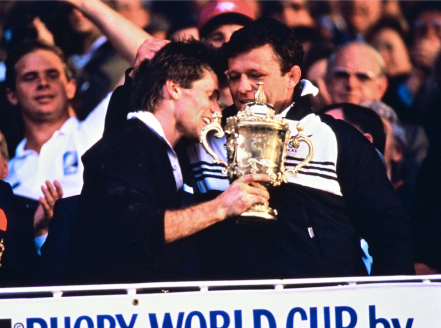 David Kirk with injured captain Andy Dalton after winning the Rugby World Cup. Photo / Photosport