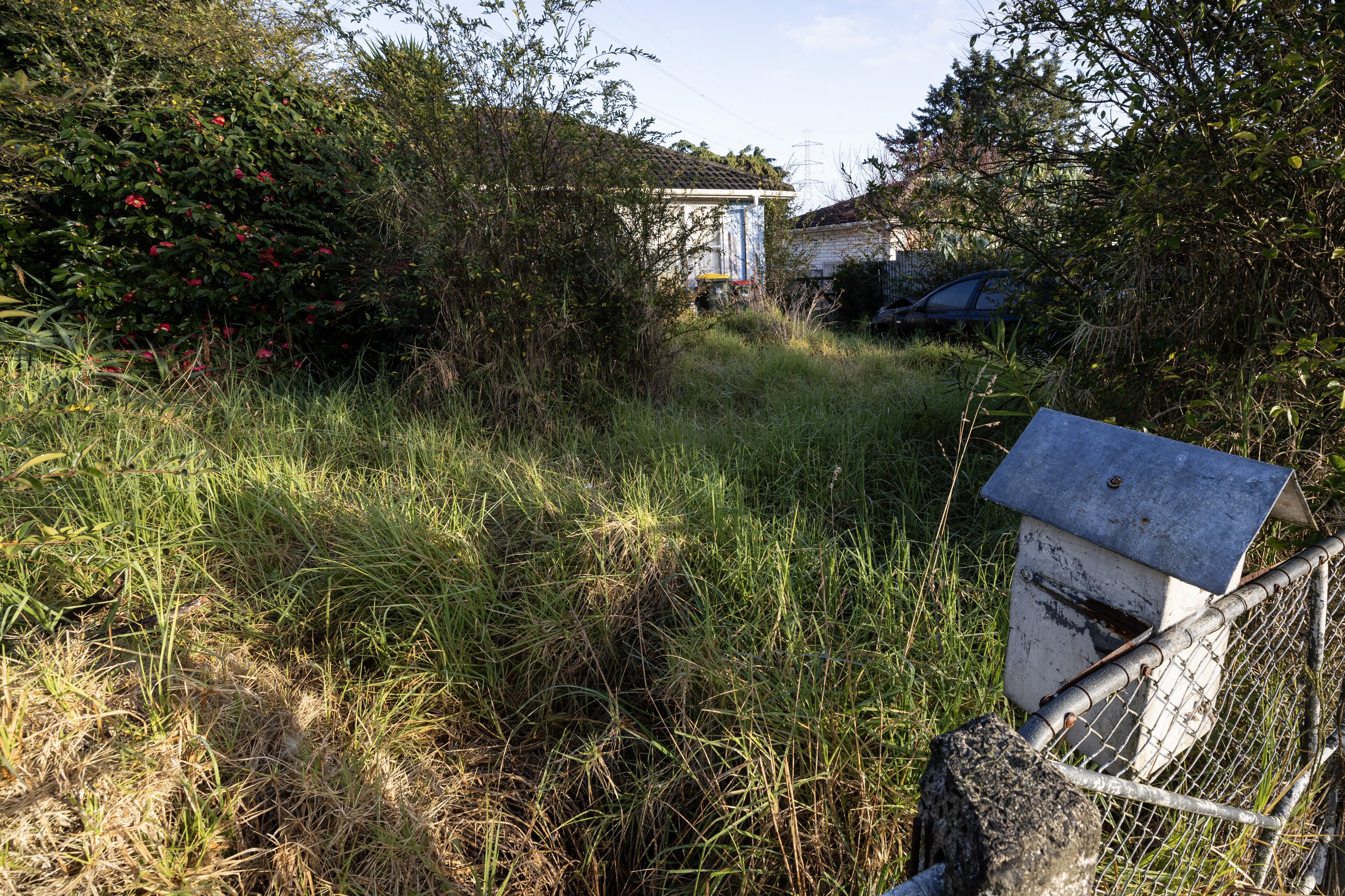 The owners of this Guthrey Place, Ōtara house haven't made a rates payment in 19 years. But Auckland Council has now abandoned plans to forcibly sell the property by public auction. Photo / Jason Oxenham