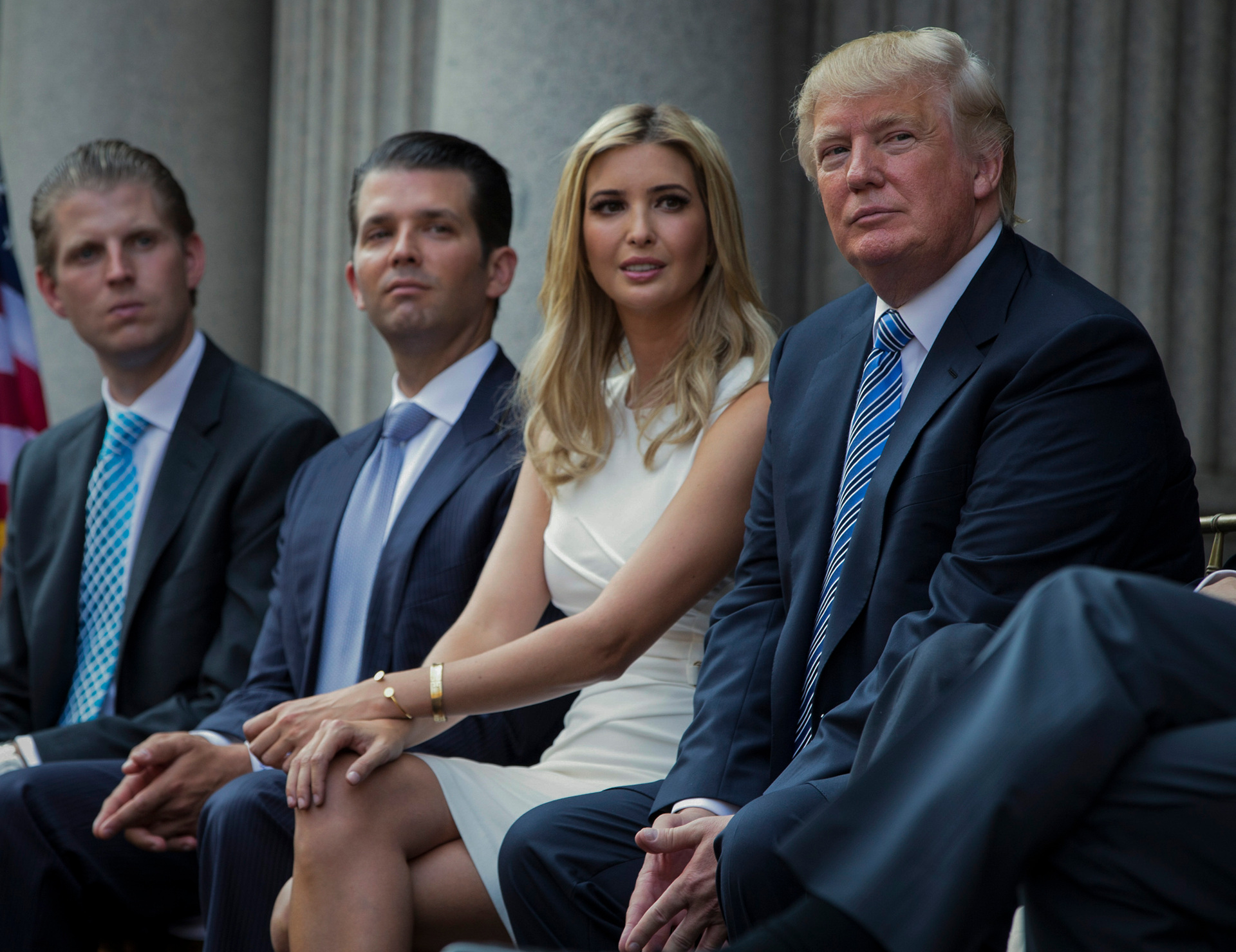 Donald Trump, right, with his children Eric Trump, Donald Trump Jr., and Ivanka Trump at a groundbreaking for the Trump International Hotel in 2014. Photo / Evan Vucci, AP, File