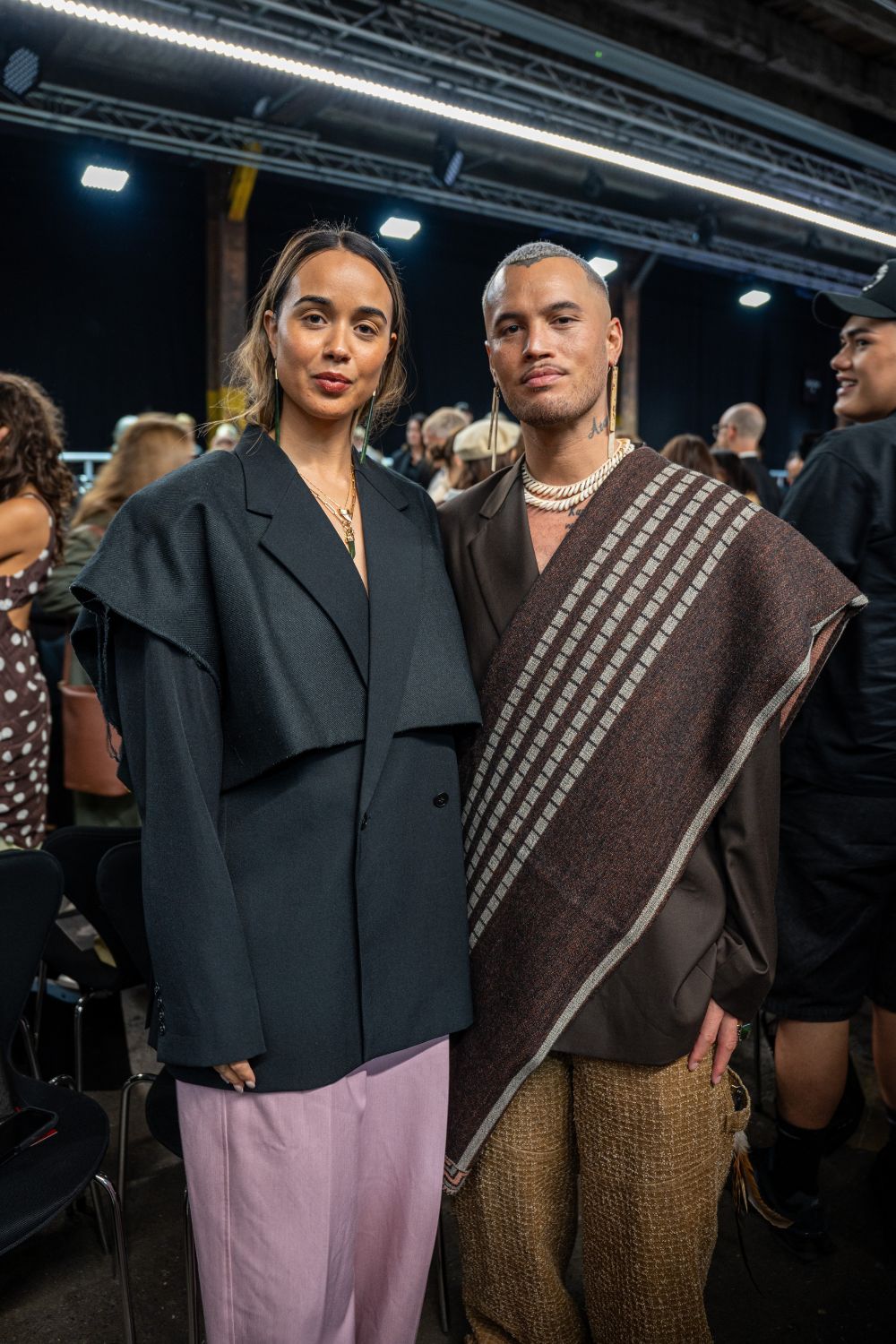 Stan Walker wears Noa Blanket, You Know sample pants and a jacket he designed. Lou Tyson wears You Know pants, a blazer Stan designed and jewellery the couple designed together. Photo / Alyse Wright