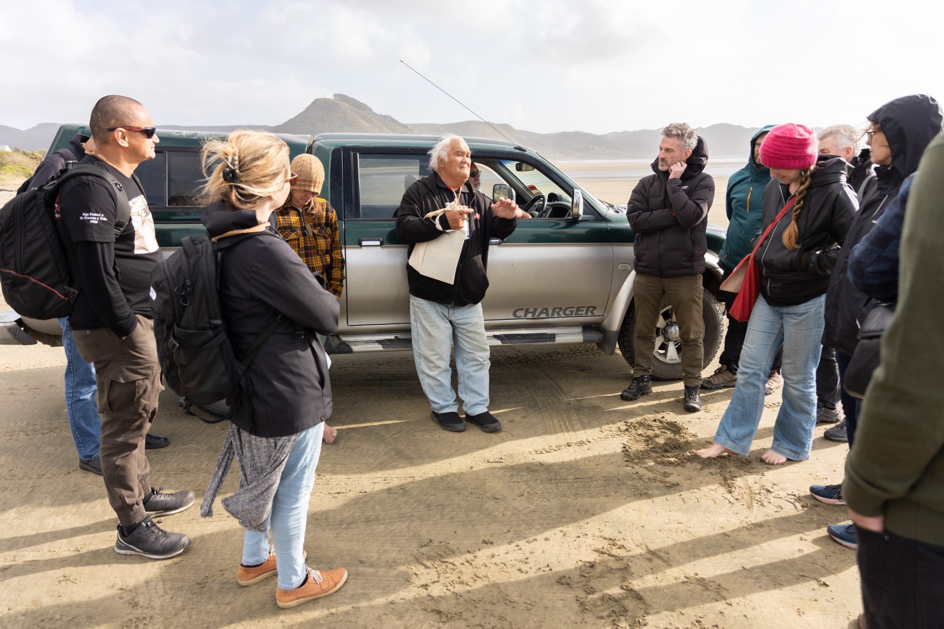 Heta Conrad speaking to participants on 90 Mile Beach. Photo / Jos Wheeler