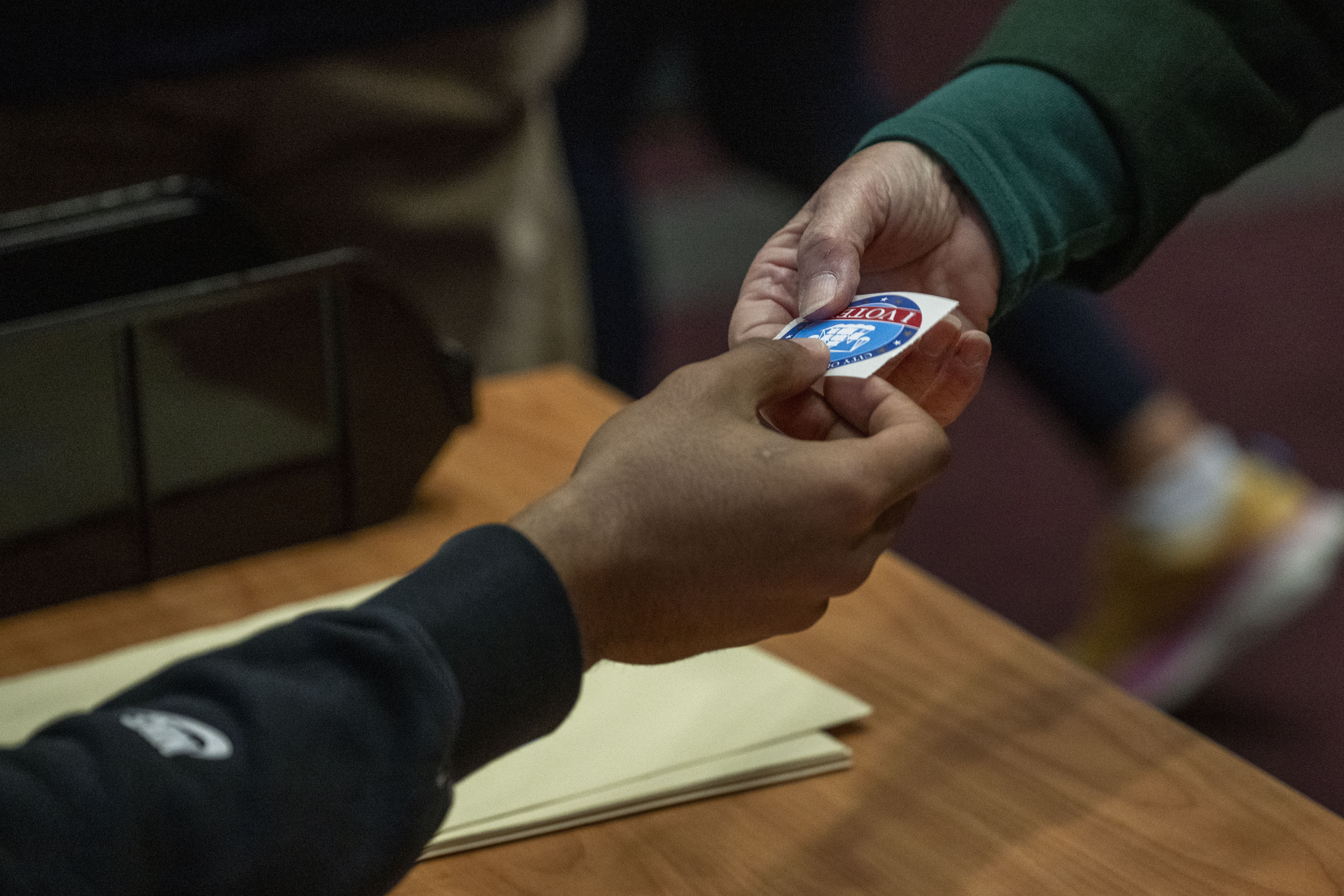 A Super Tuesday voter takes an