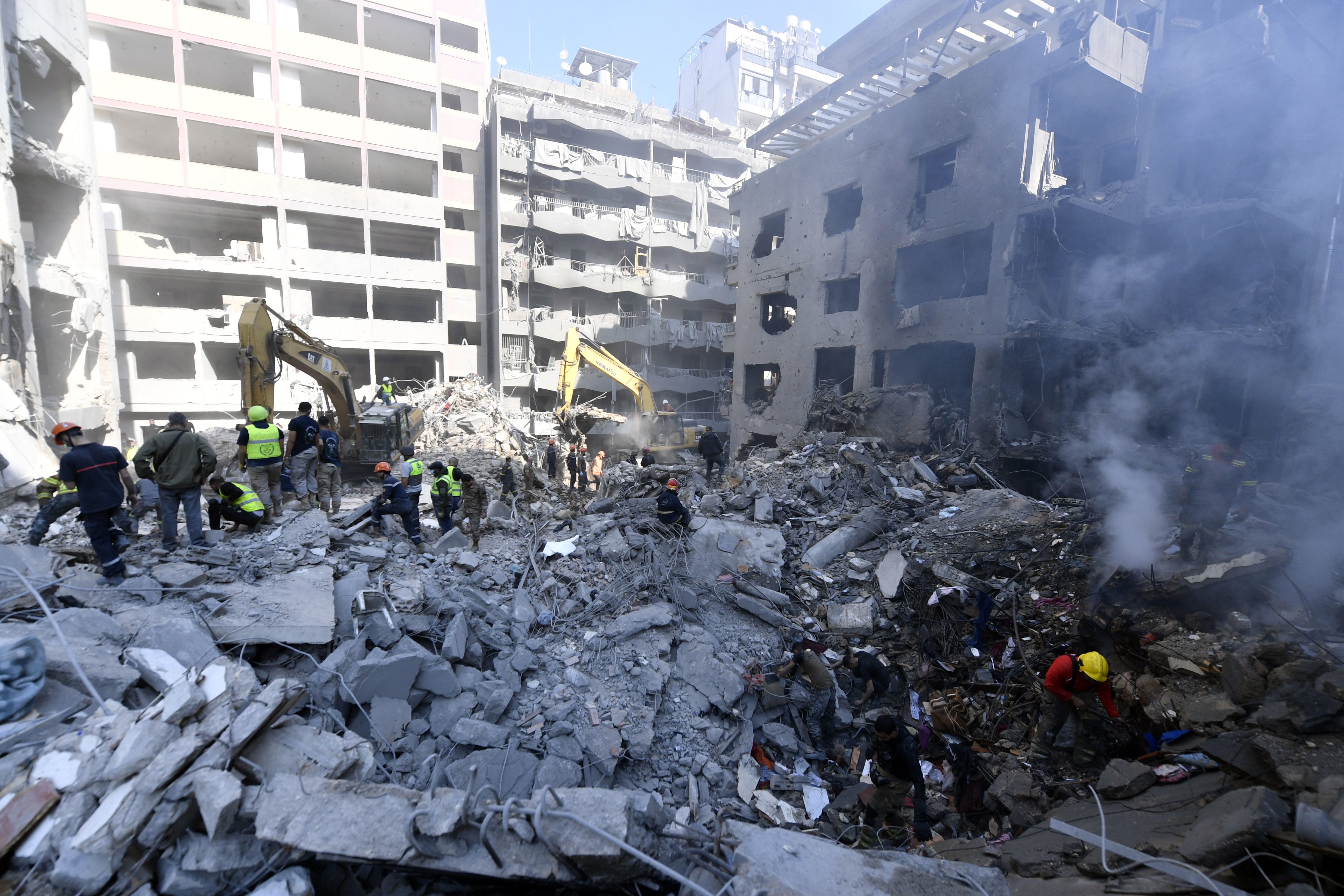 Civil defense teams conduct debris removal and search-and-rescue operations after an Israeli attack on al-Mamun Street in the al-Basta district which destroyed an eight-storey building in Beirut. Photo / Getty Images