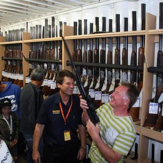 David Tipple (centre) inside Gun City in Christchurch. Photo / File