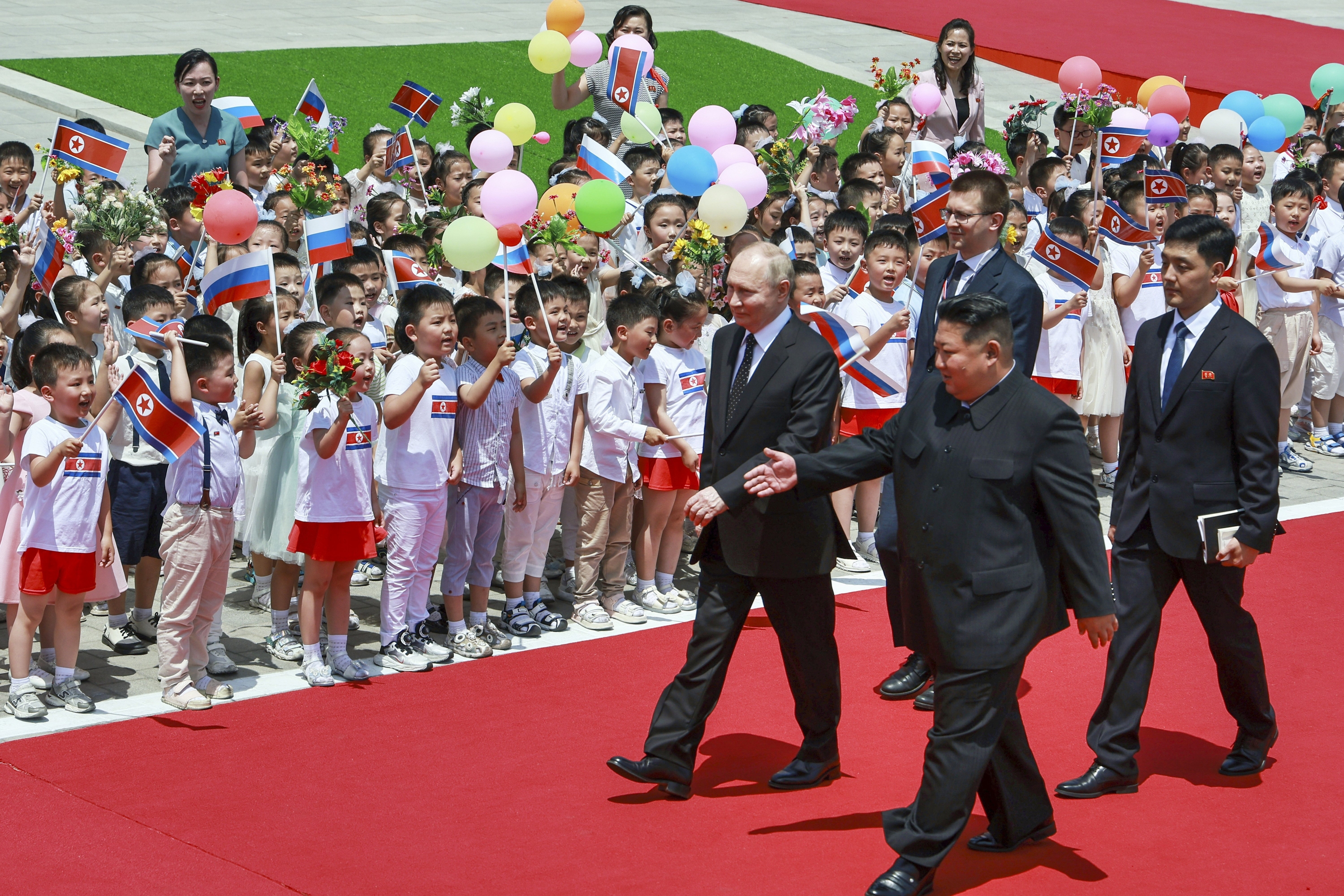 Putin was welcomed on Wednesday in a ceremony at the city’s main square, filled with what appeared to be tens of thousands of spectators. Photo / Sputnik, Kremlin Pool Photo via AP