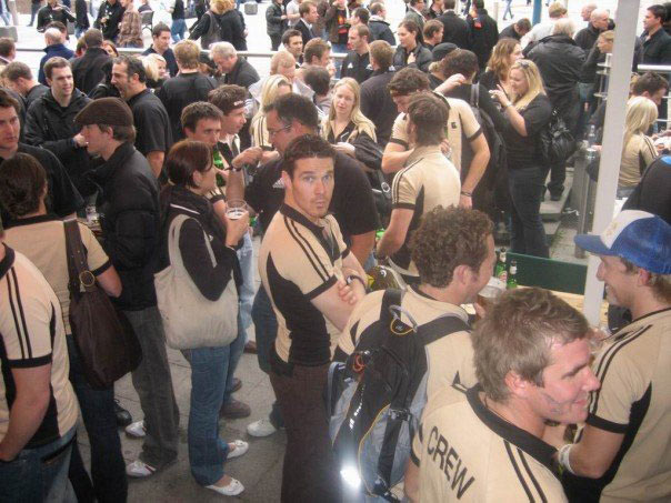 Members of the Beige Brigade tour at a pub before the game. 