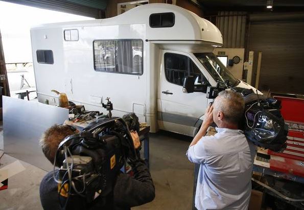 Media film the campervan after the discovery of 440kg of methamphetamine inside. Photo / Michael Cunningham