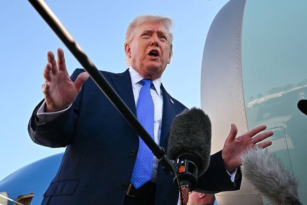 US President Donald Trump speaks to reporters before boarding Air Force One at Palm Beach International Airport on March 23, 2026 in West Palm Beach, Florida. Photo / Getty Images