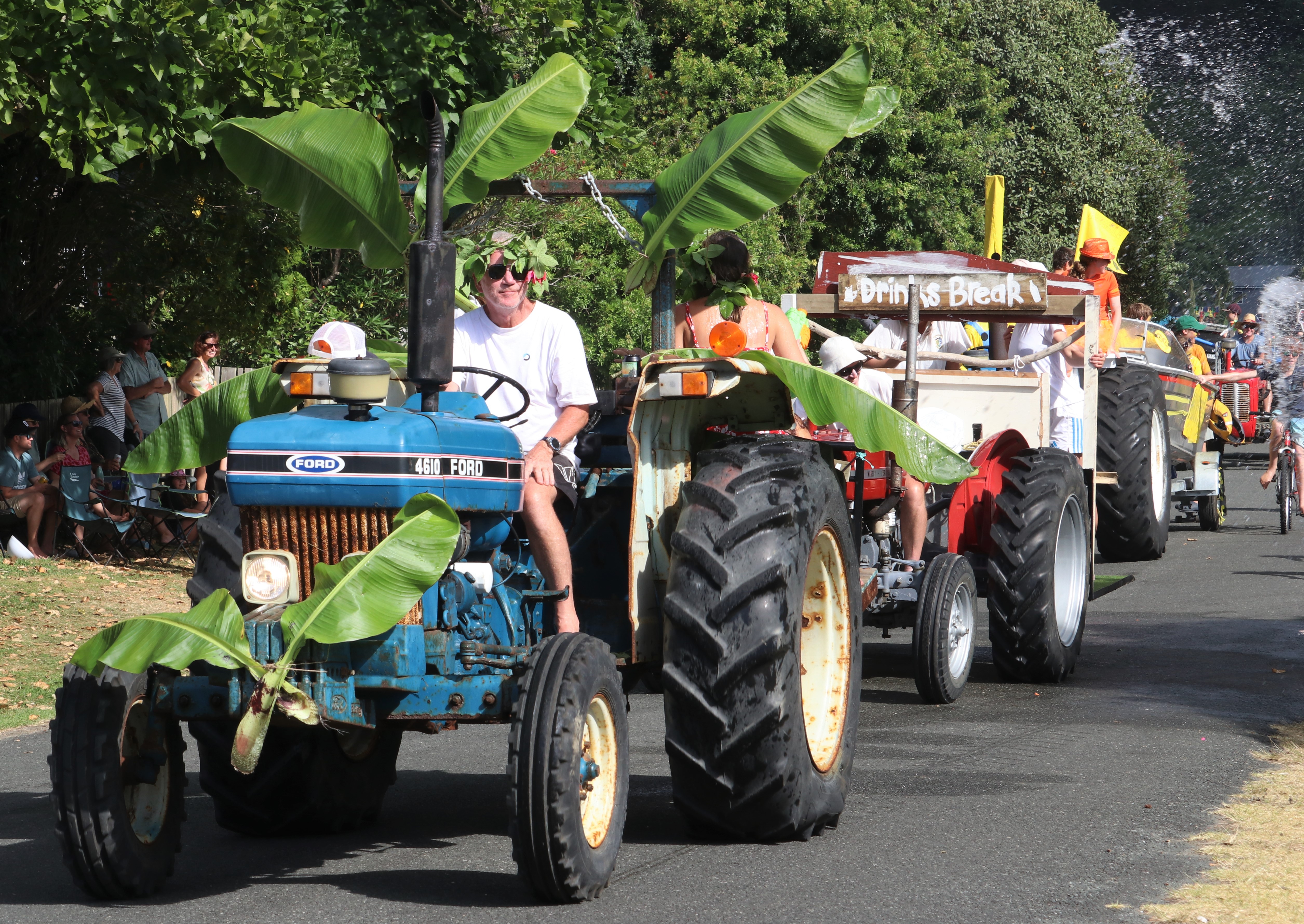 Tractors make their way along the parade route. Photo / Peter de Graaf