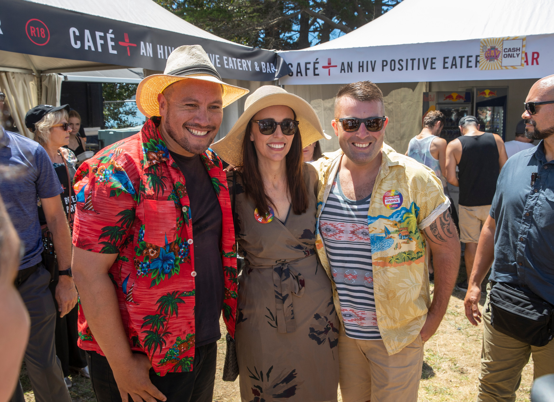 Prime Minister Jacinda Ardern with Labour MP Tamati Coffey and his partner Tim Smith at the 20th anniversary Big Gay Out. Photo / Peter Meecham