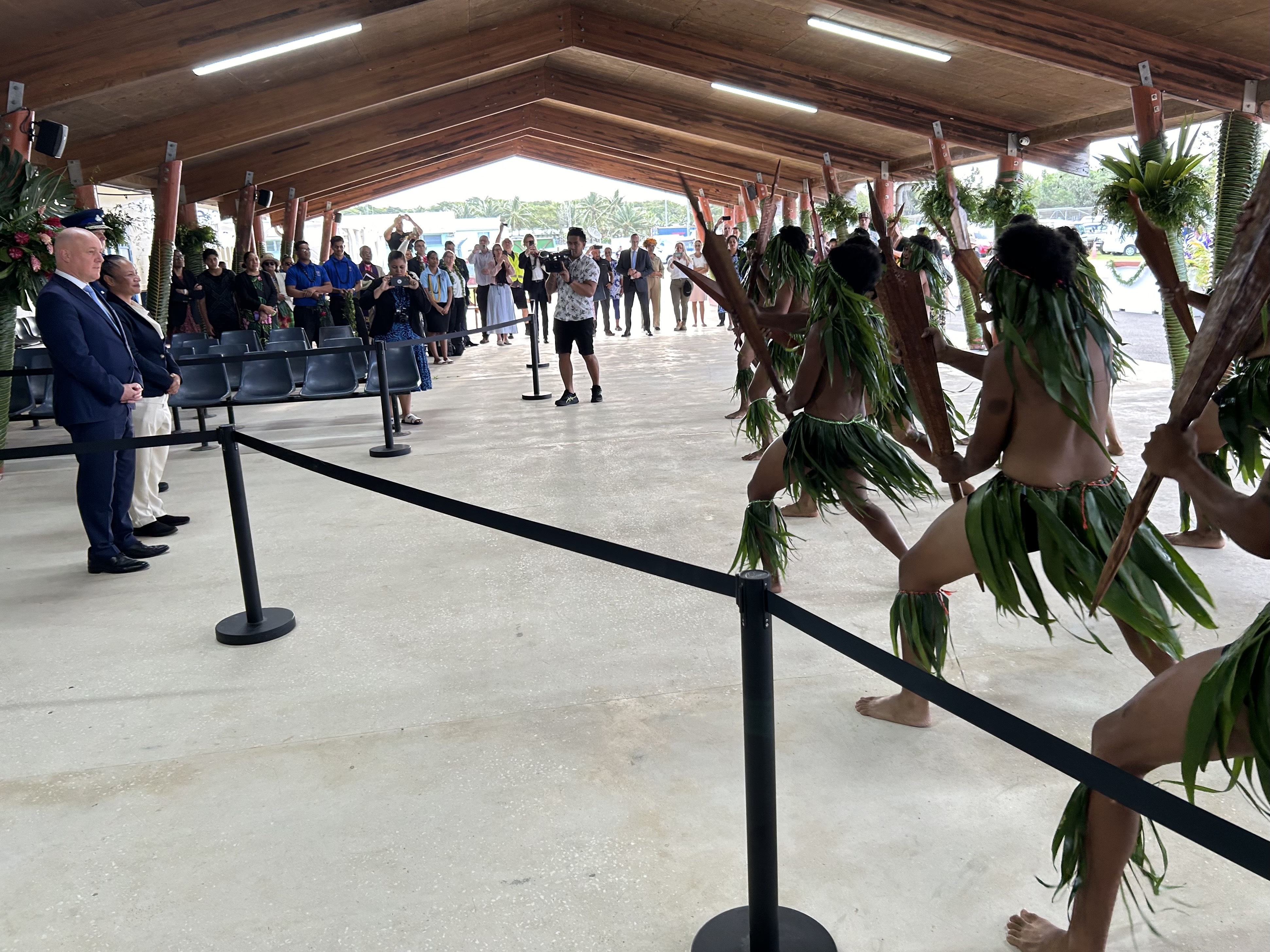 Niuean warriors welcome Prime Minister Christopher Luxon to Niue. Photo / Adam Pearse
