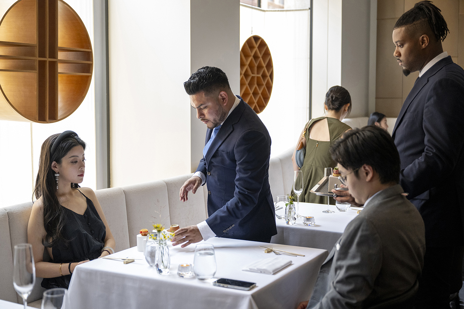 Patrons dine at Jungsik in New York. Korean cuisine stepped out on a global stage just as South Korean music, movies and art were gaining attention. Photo / Evan Sung, The New York Times