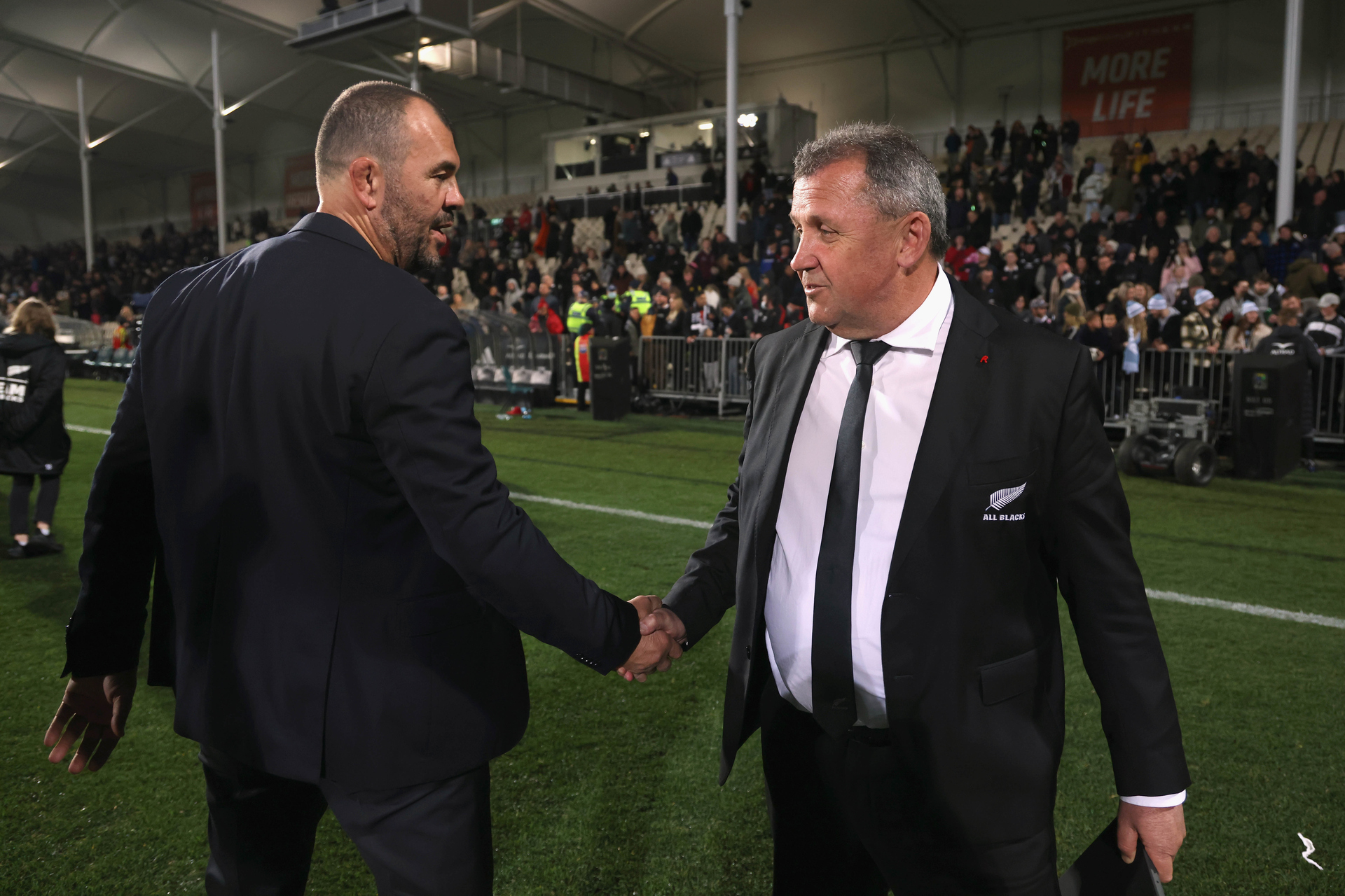 Argentina coach Michael Cheika shakes hands with All Blacks coach Ian Foster after the game. Photo / Photosport