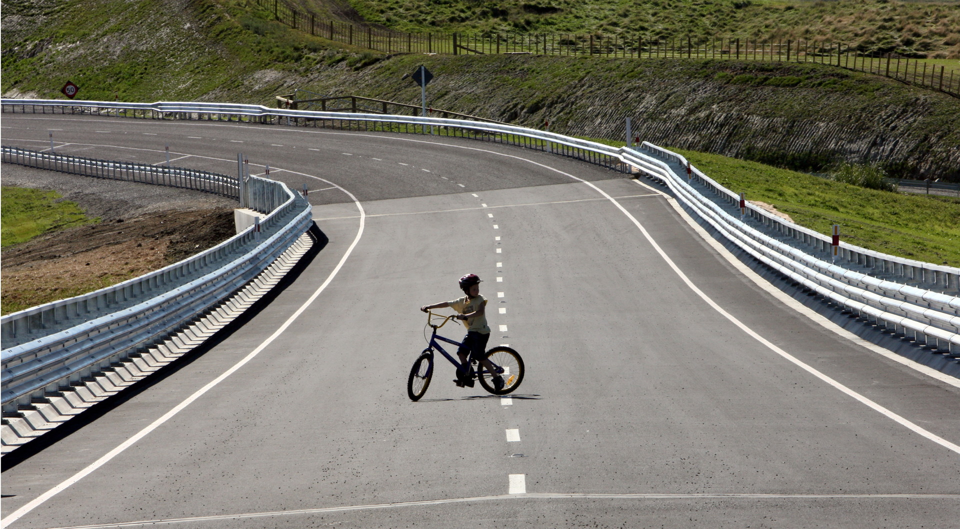 A boy and his bike on State Highway 2's Matahorua Bridge just before it opened in 2011. Now it's time for the Waikare Gorge to get some work. Photo / File
