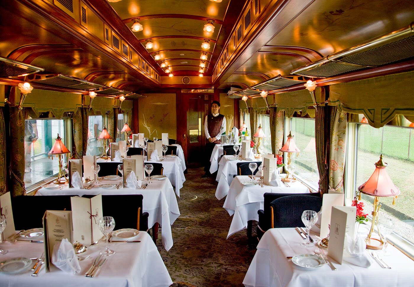 During the pandemic, The Eastern & Oriental Express underwent a stunning restoration, enhancing its deep bottle green exterior with cherrywood panelling and oriental silk decor.