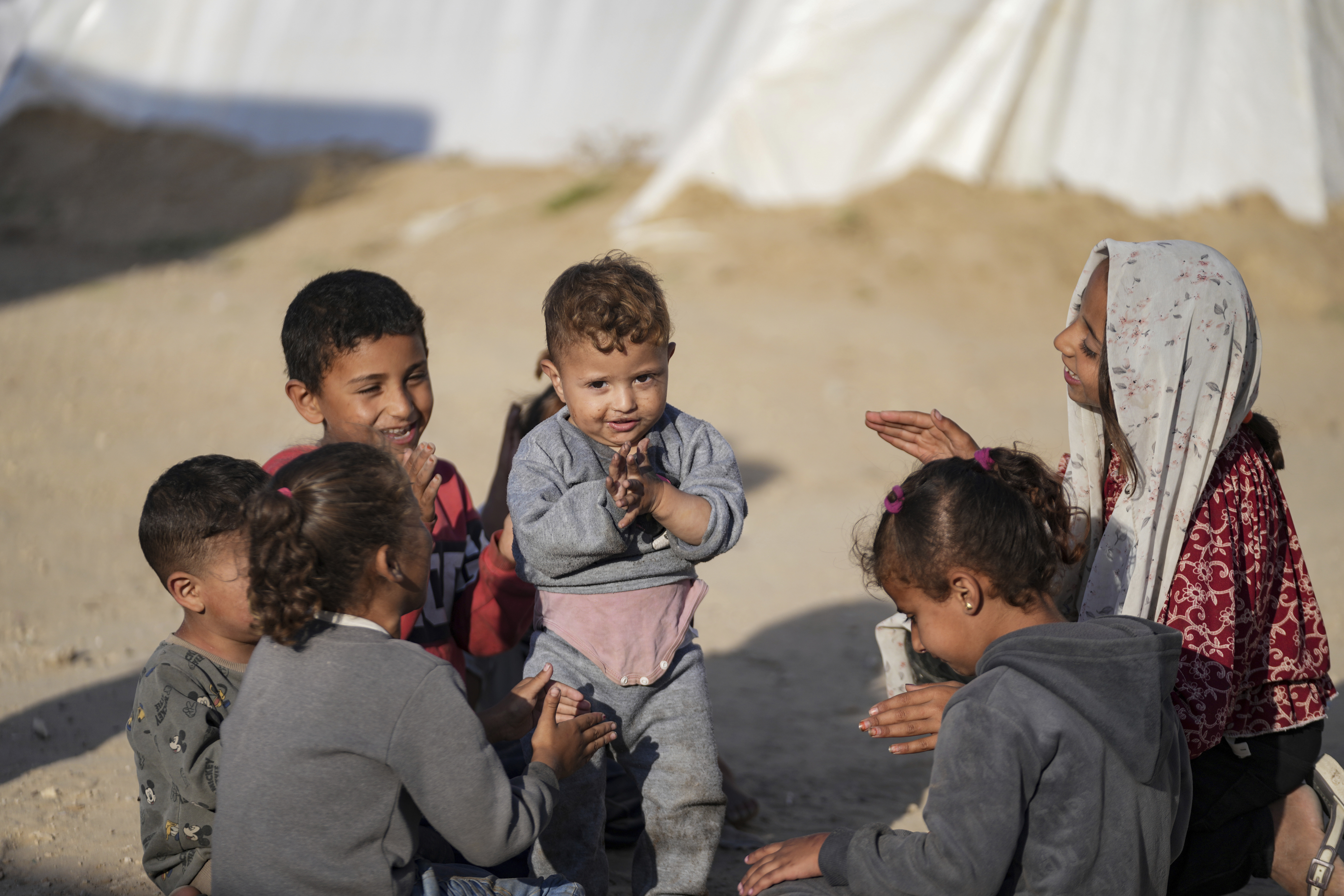 Palestinian children, displaced by the Israeli air and ground offensive on the Gaza Strip. Photo / AP