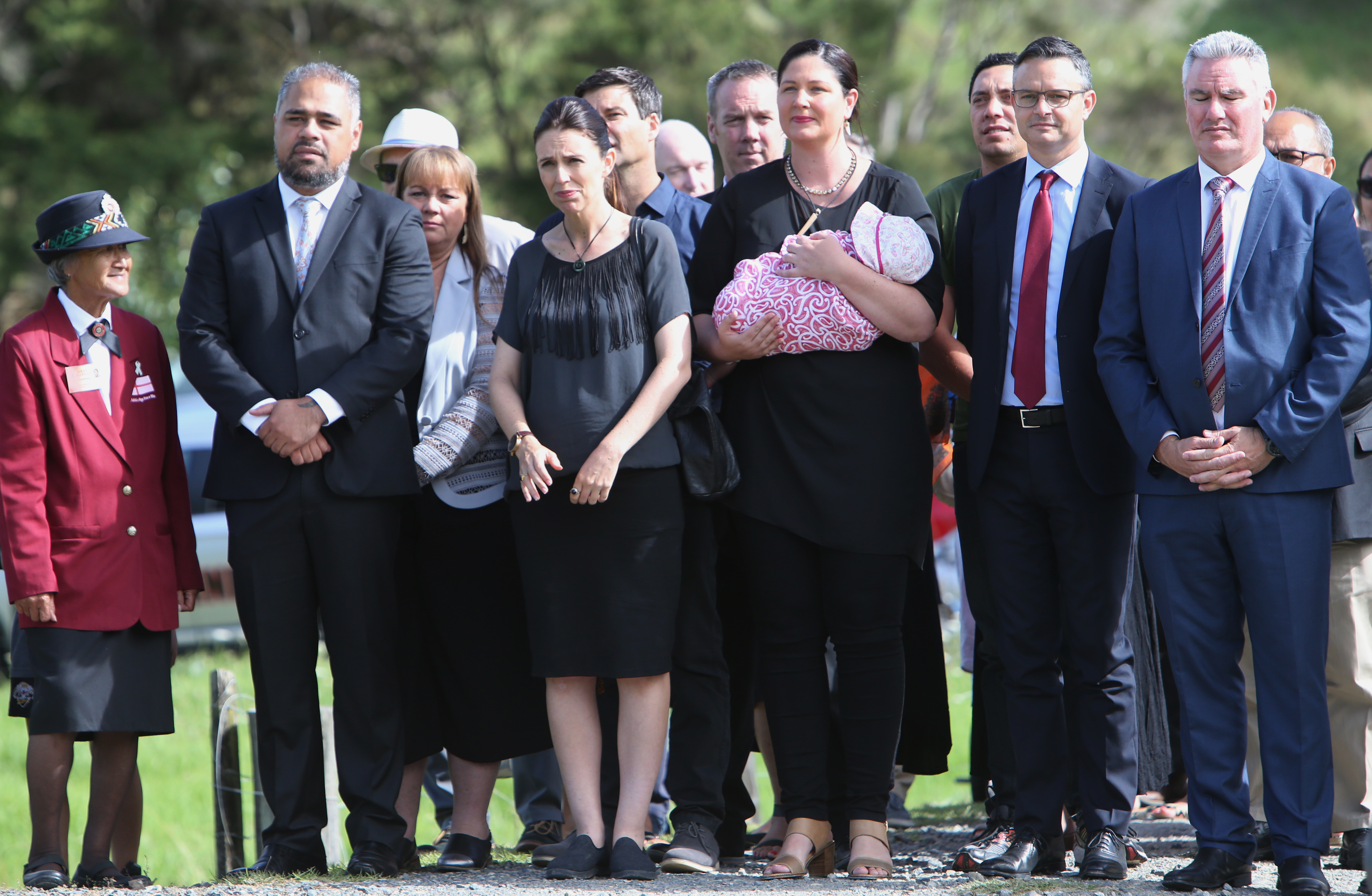 Labour MPs Peeni Henare and Willow-Jean Prime flank former Prime Minister Jacinda Ardern during a pōwhiri in 2021.