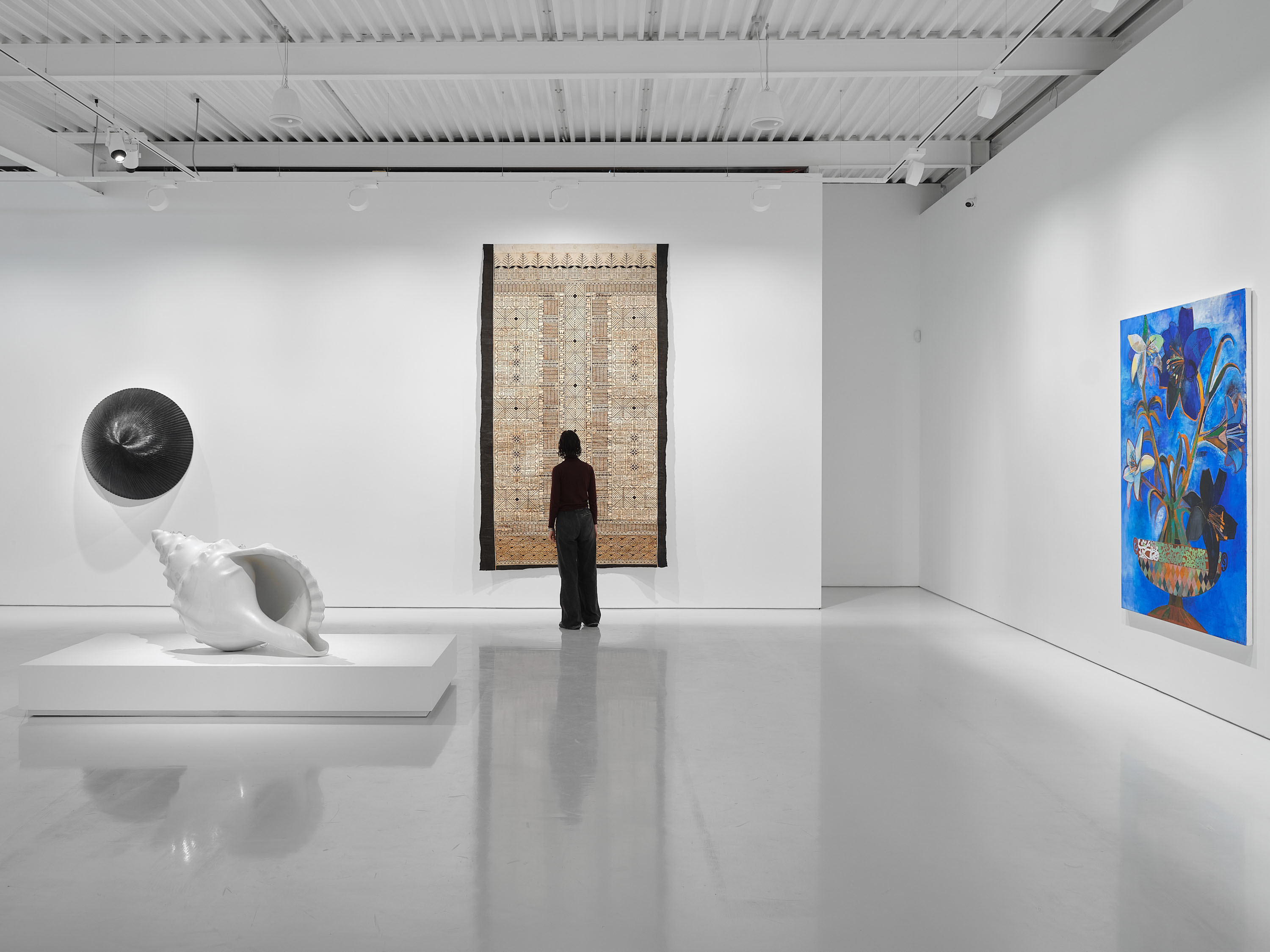 Gow Langsford’s inaugural exhibition ‘This Must Be The Place’ includes artworks by, from left, Brett Graham, '90.000 N 135.000 W', 2021; Reuben Paterson, 'Koro', 2023; Dame Robin White, 'Your Journey Starts Here', 2022; Shane Cotton, 'Te U Kai Po', 2023-24. Photo / Sam Hartnett