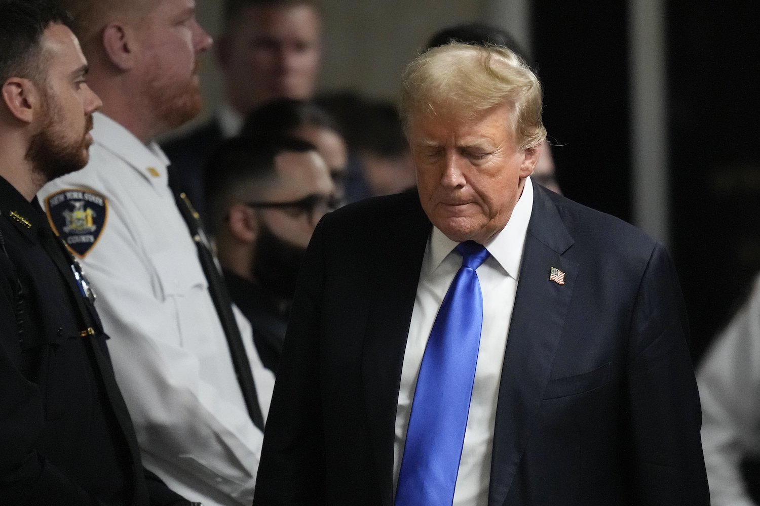 Trump walks to make comments to members of the media. Photo / AP