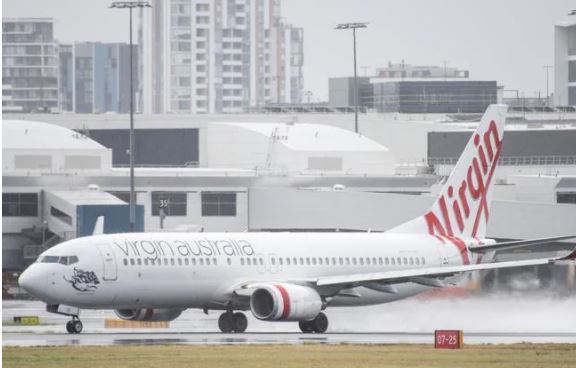 Urgent alerts have been issued for Sydney, Brisbane, Melbourne and Gold Coast flights, after a cabin crew member tested positive to Covid-19. Photo / NCA