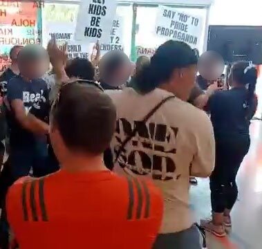  Destiny Church groups Man Up and Legacy Sisterhood protest against a children's library drag event at Te Atatū Community Centre. 