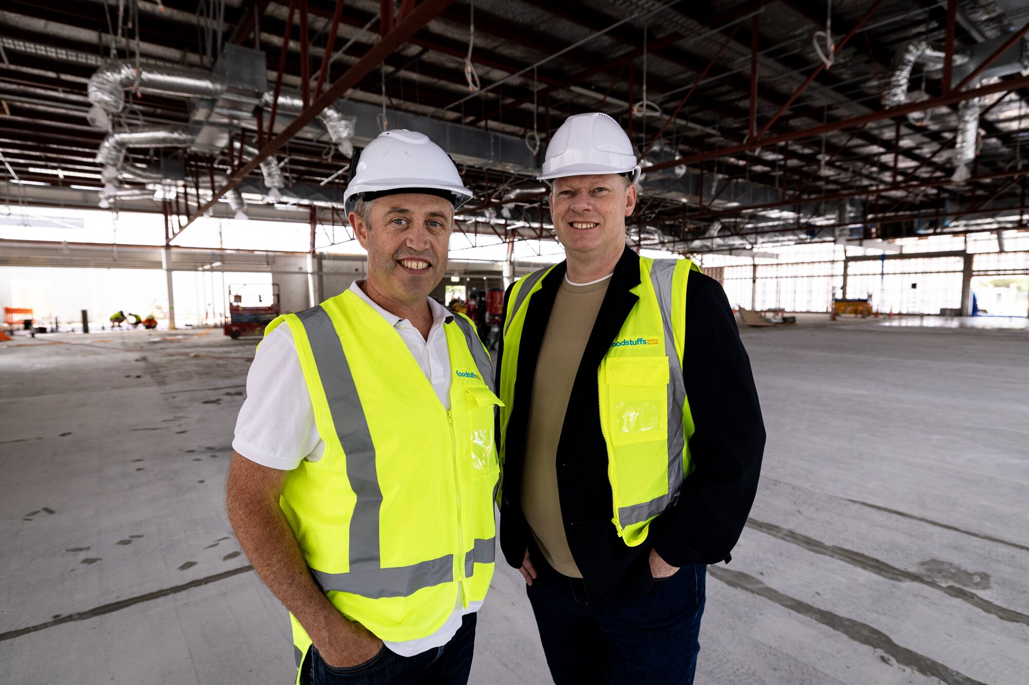 Foodstuffs North Island's property head Nick Hanson (left) and retail and property general manager Lindsay Rowles at the under-construction New World Te Atatū. Photo / Dean Purcell