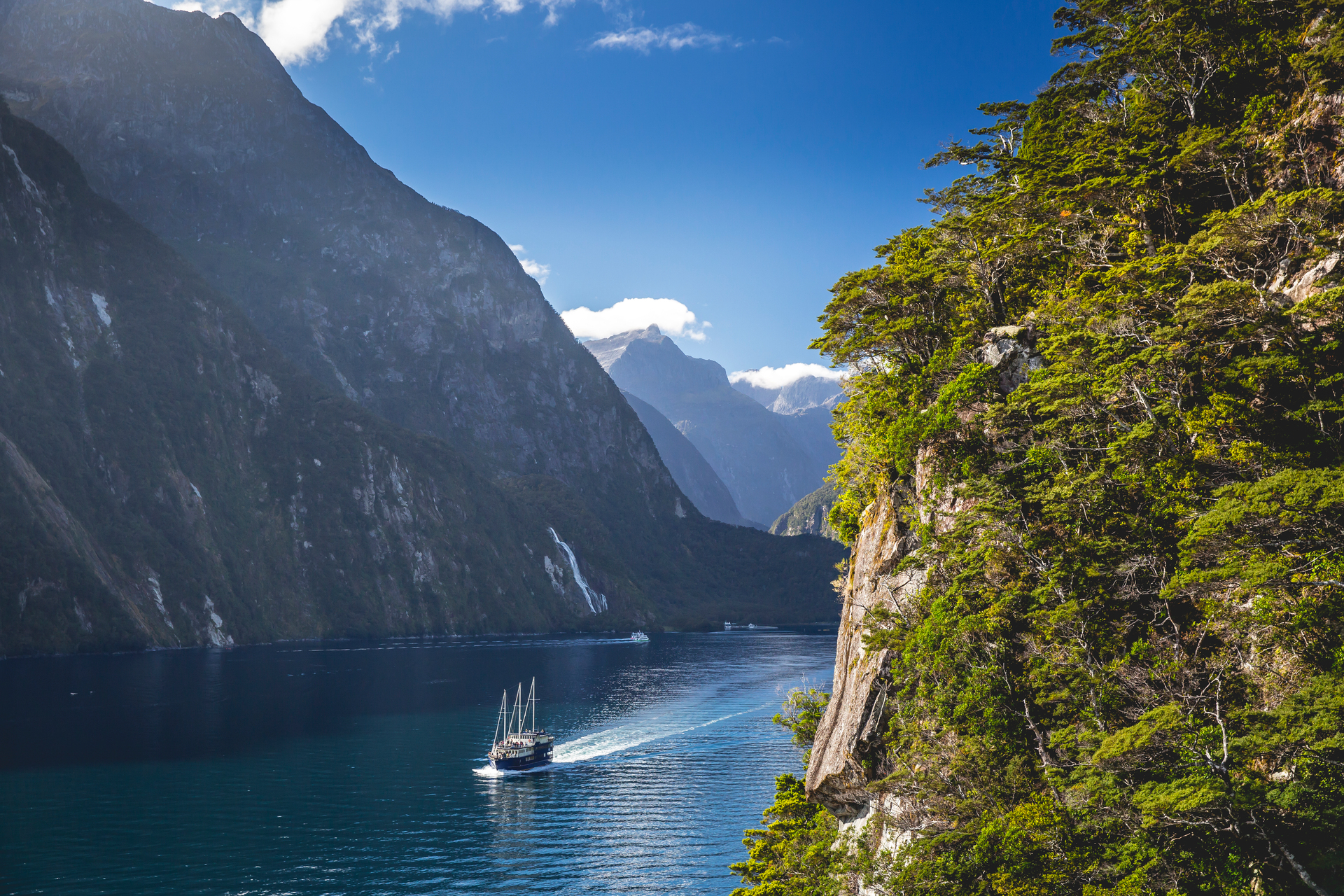 Milford Sound is set for change, with the possibility of a ban on fixed-wing aircraft, overseas visitors having to pay to enter the area and a ban on cruise ships in the inner sound. Photo / Supplied