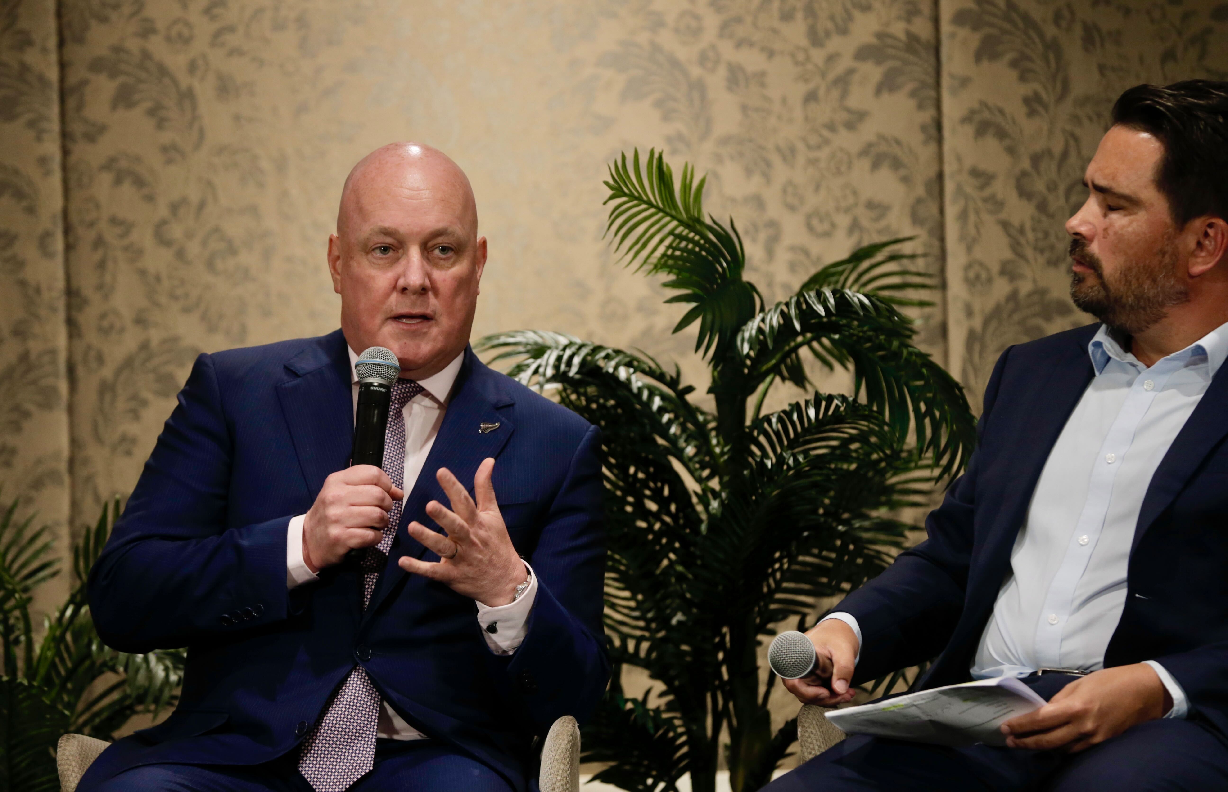 Prime Minister Christopher Luxon (left) and Auckland Regional Chamber of Commerce chief executive Simon Bridges (right) at the Cordis Hotel. Photo / Alex Burton