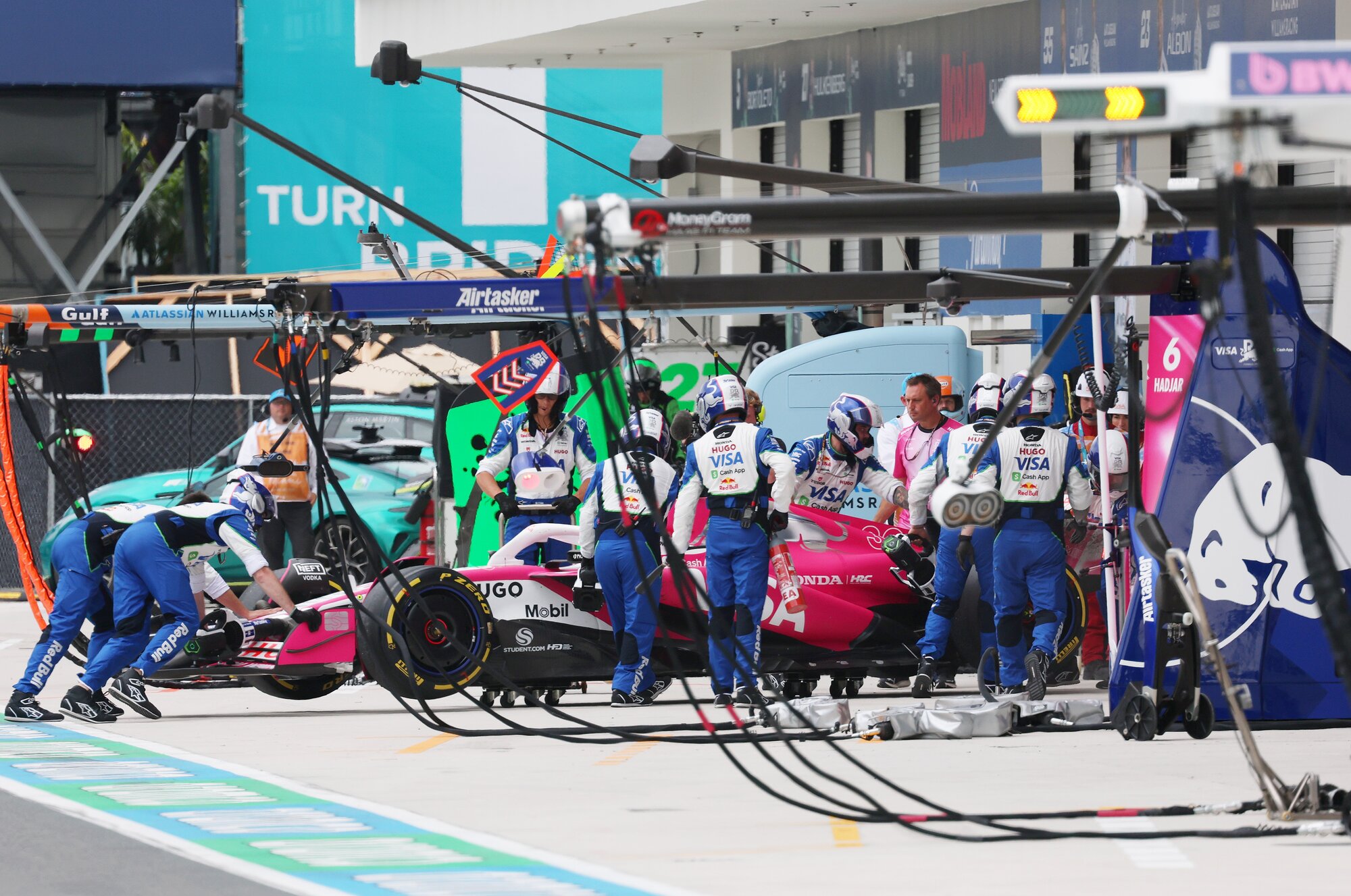 Liam Lawson's damaged Racing Bulls car is pulled into the pitlane garage in Miami. Photo / Red Bull
