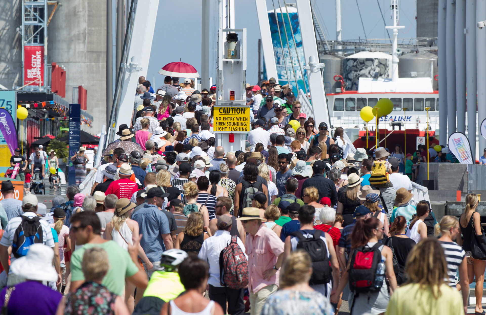 Te Wero bridge at the Viaduct Harbour is going to be replaced because it's deemed too small to cope with crowds expected at the next America's Cup. Photo / NZ Herald