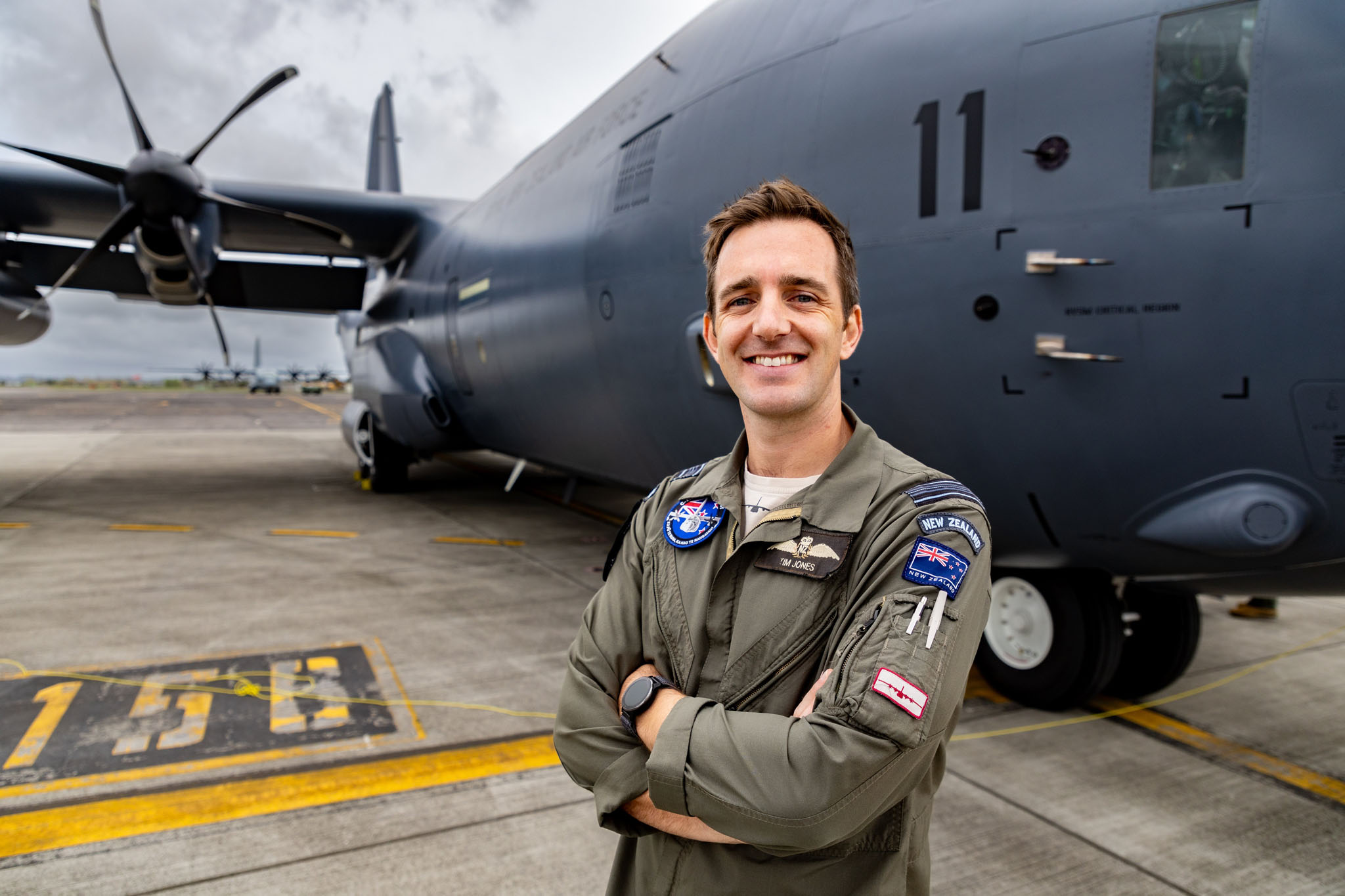 Squadron Leader Tim Jones with the Lockheed Martin C-130J Hercules. Photo / Michael Craig
