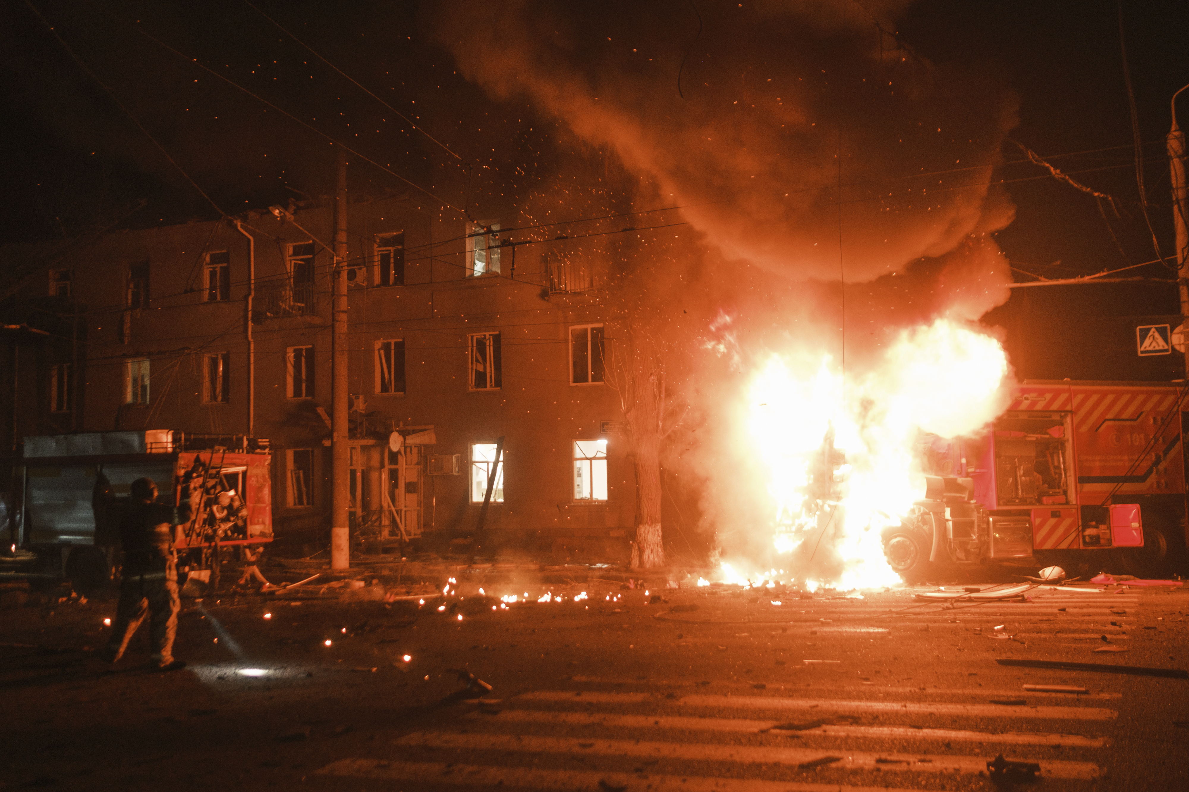 Firefighters work in a residential neighbourhood in Kharkiv, Ukraine. Photo / AP