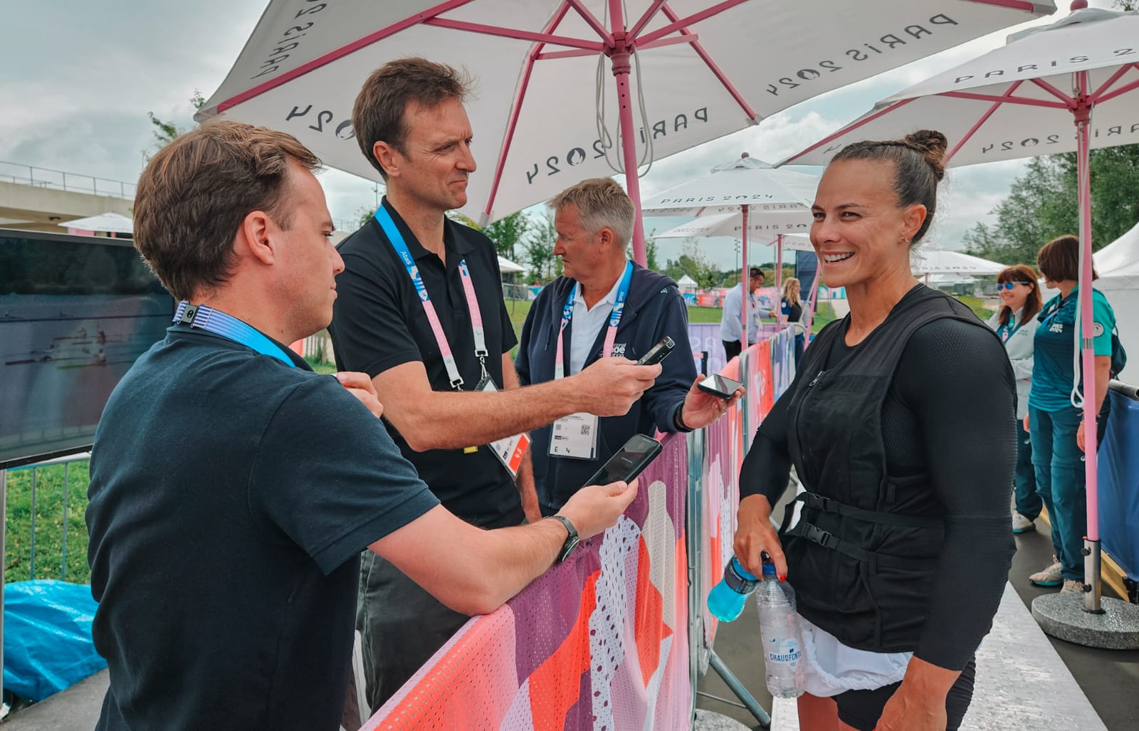Dame Lisa Carrington talking with media after her K1 500m heats at the Paris Olympics. Photo: Michael Burgess/NZH