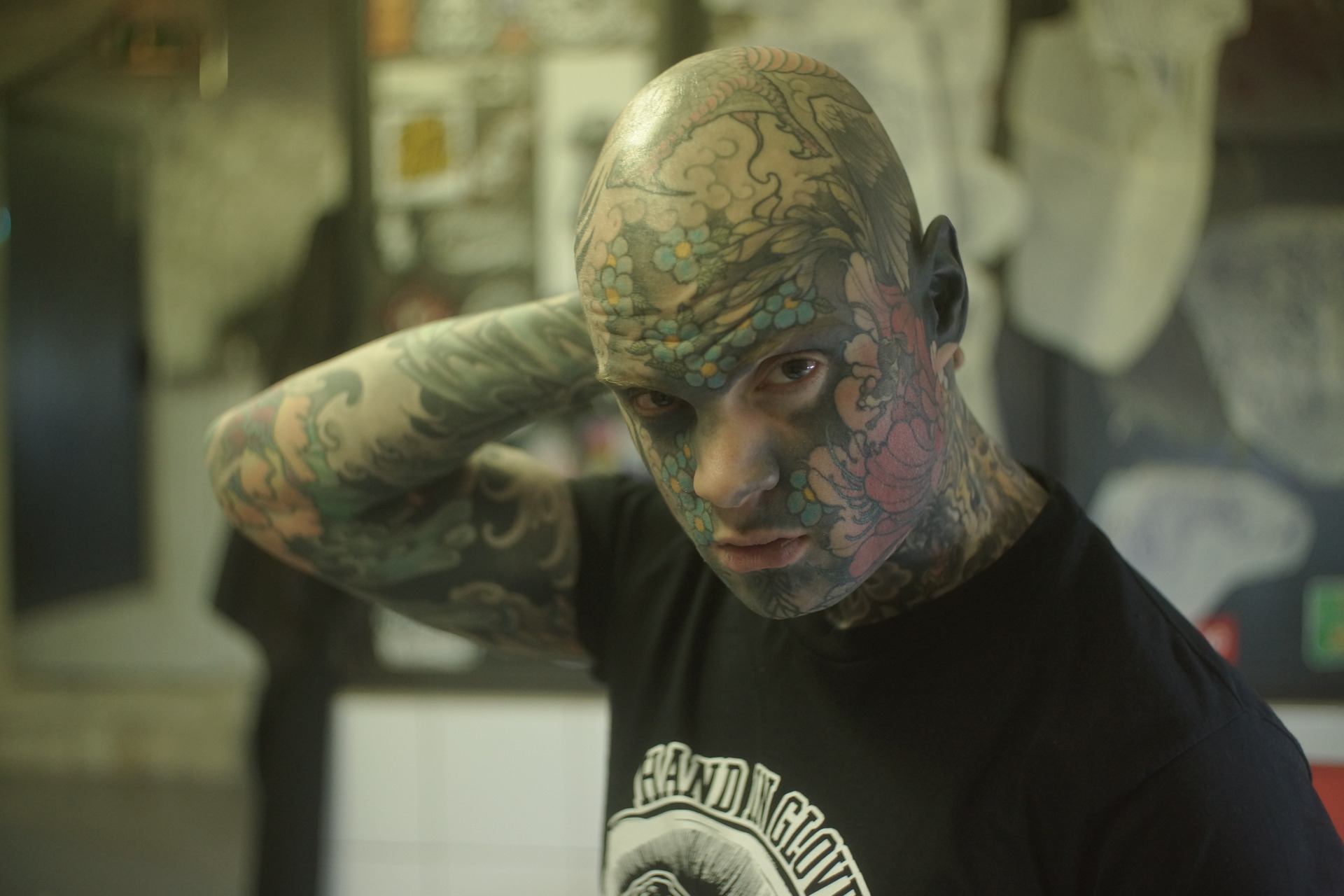 Man who tattooed his eyes black loses teaching job - NZ Herald