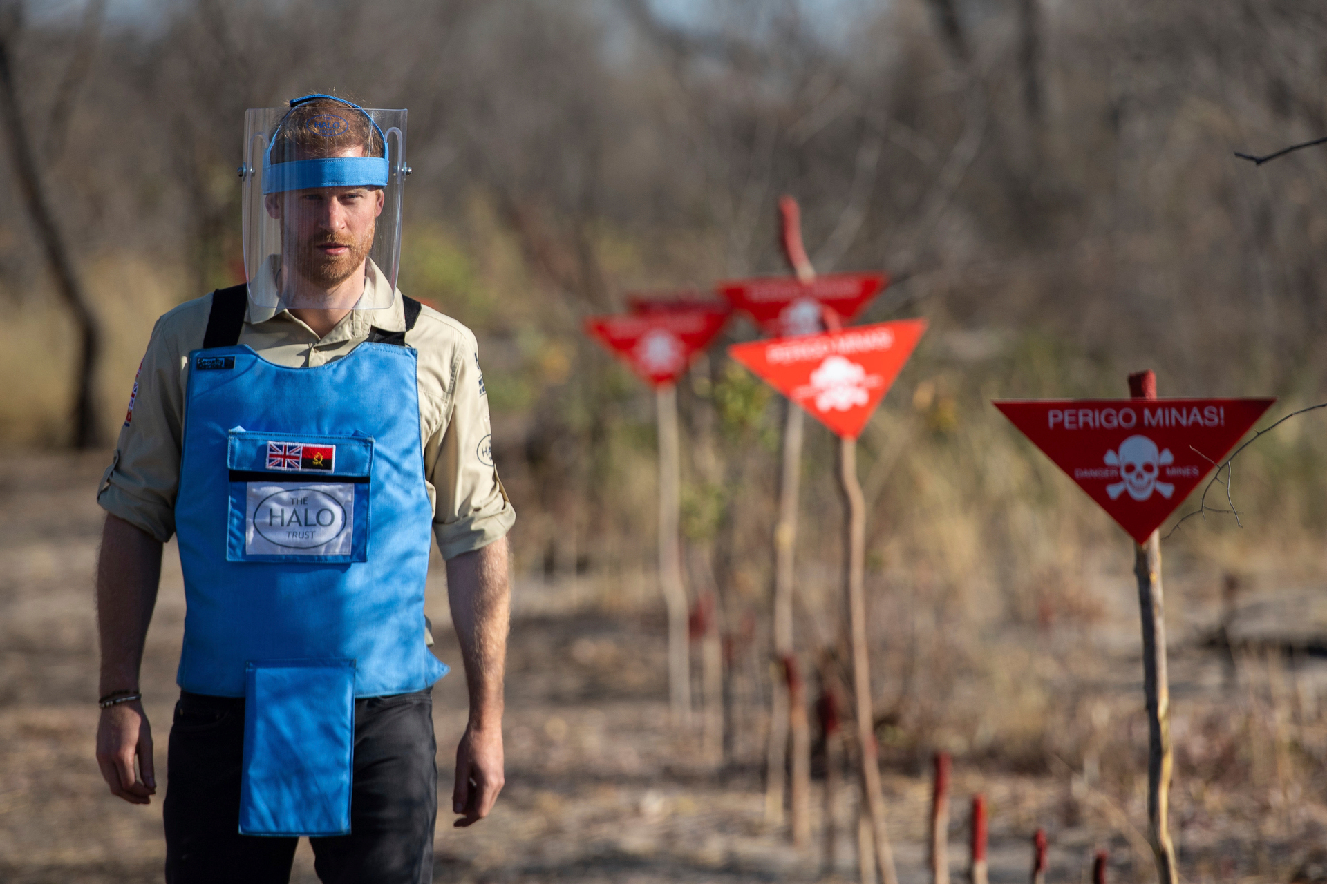 Britain's Prince Harry walks through a minefield in Dirico, Angola September 27, 2019, during a visit to see the work of landmine clearance charity the Halo Trust. Photo / AP