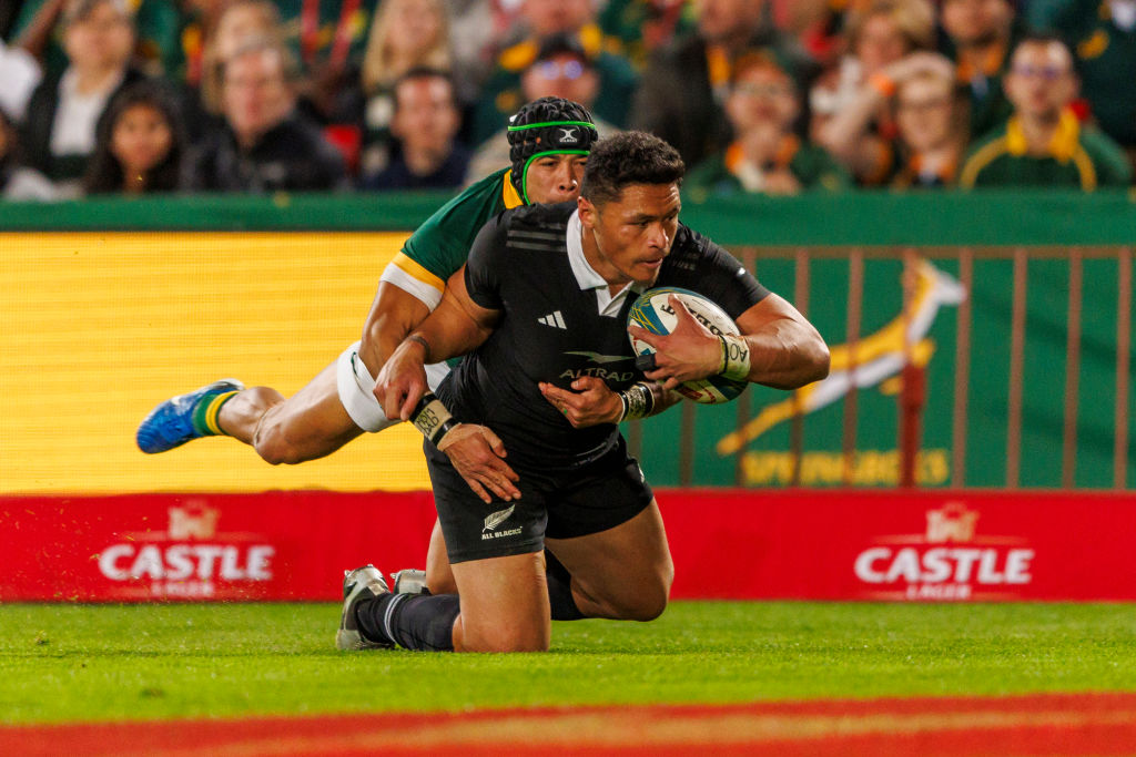 Caleb Clarke against Cheslin Kolbe for the All Blacks against South Africa. Photo / Getty Images
