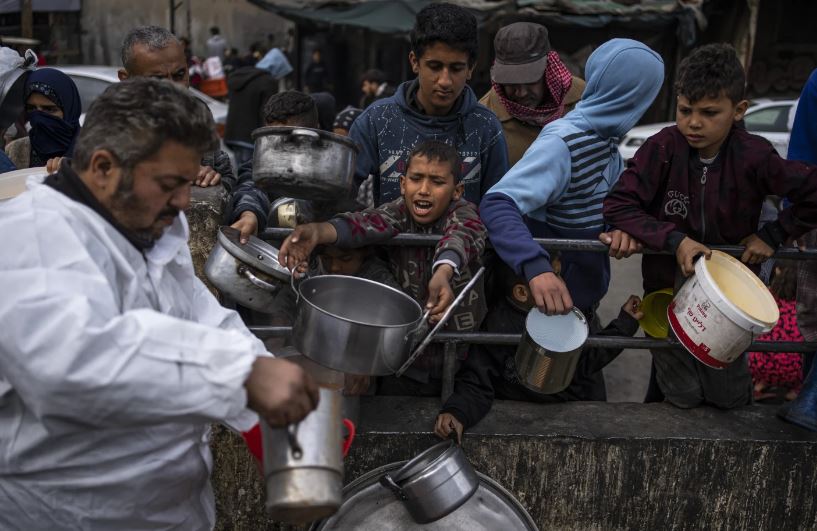 Palestinians line up for food in Rafah, Gaza Strip. Photo / AP