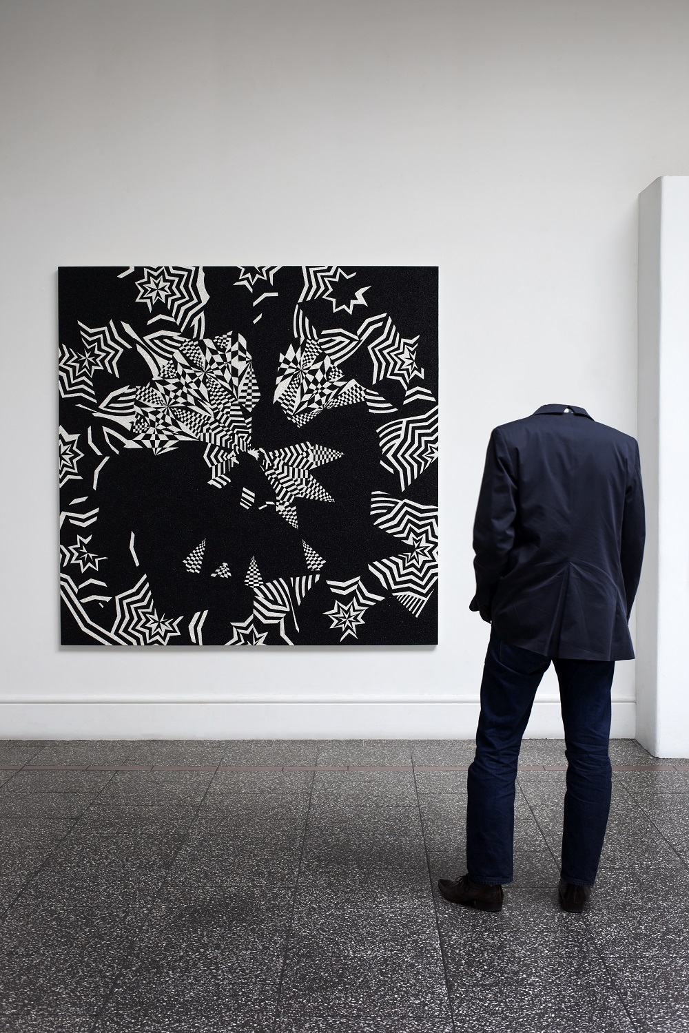 A headless Andrew Clifford wearing a World blazer. Photo / Sam Hartnett