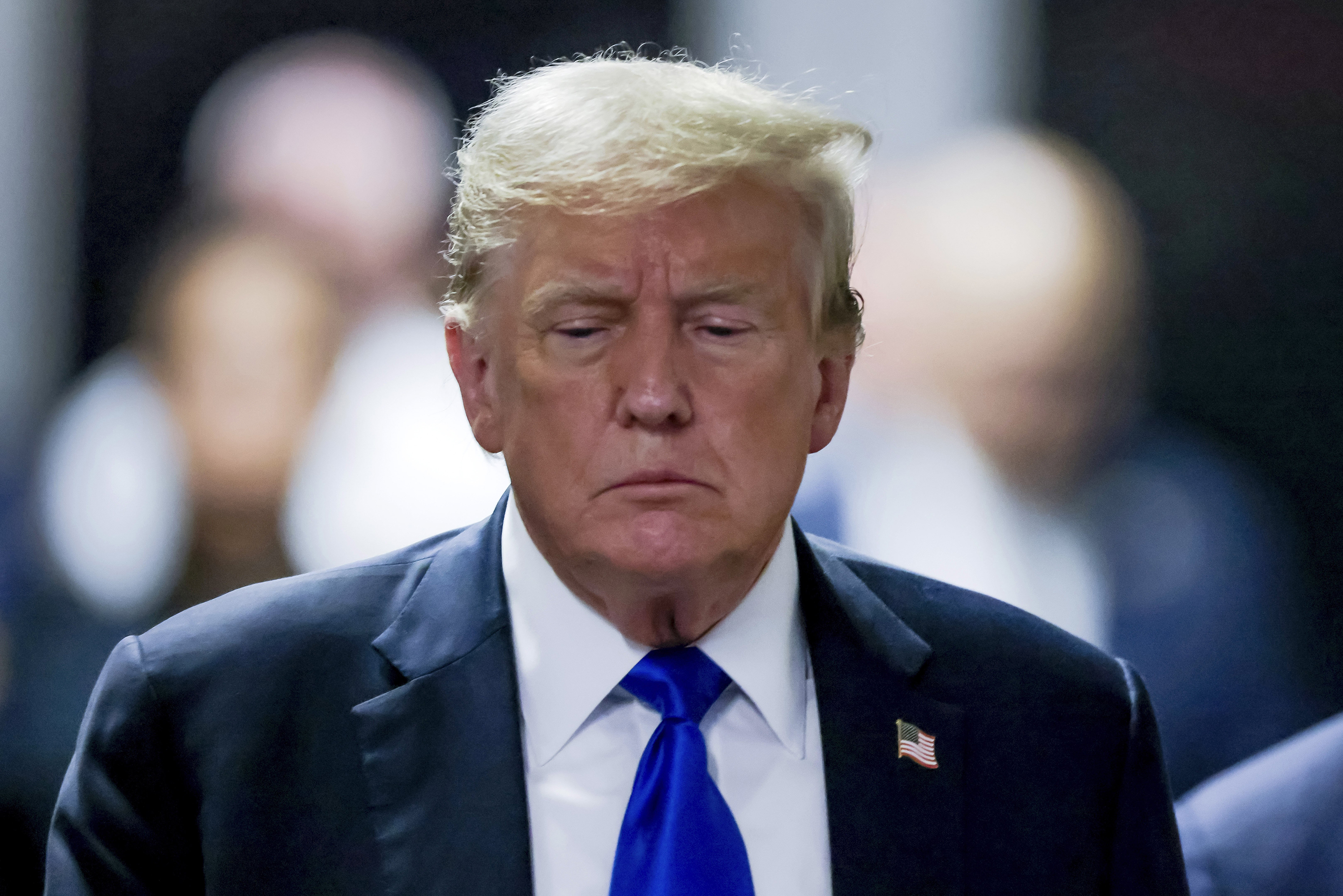 Former President Donald Trump leaves the courthouse after a jury found him guilty of all 34 felony counts in his criminal trial at Manhattan Criminal Court. Photo / AP
